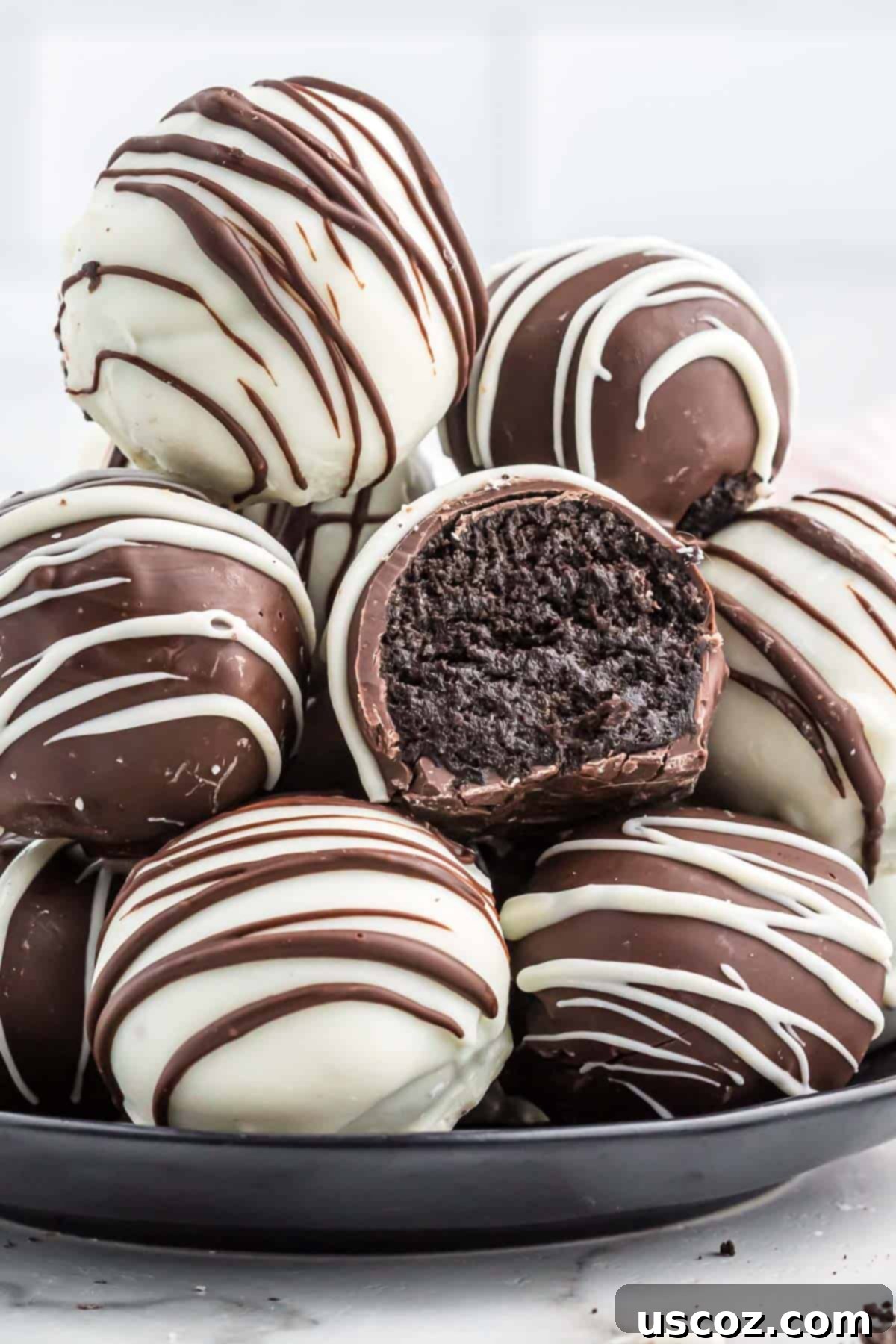 Oreo Truffles 12 A stunning arrangement of finished Oreo balls on a decorative serving plate, perfectly prepared for a gathering or special occasion.