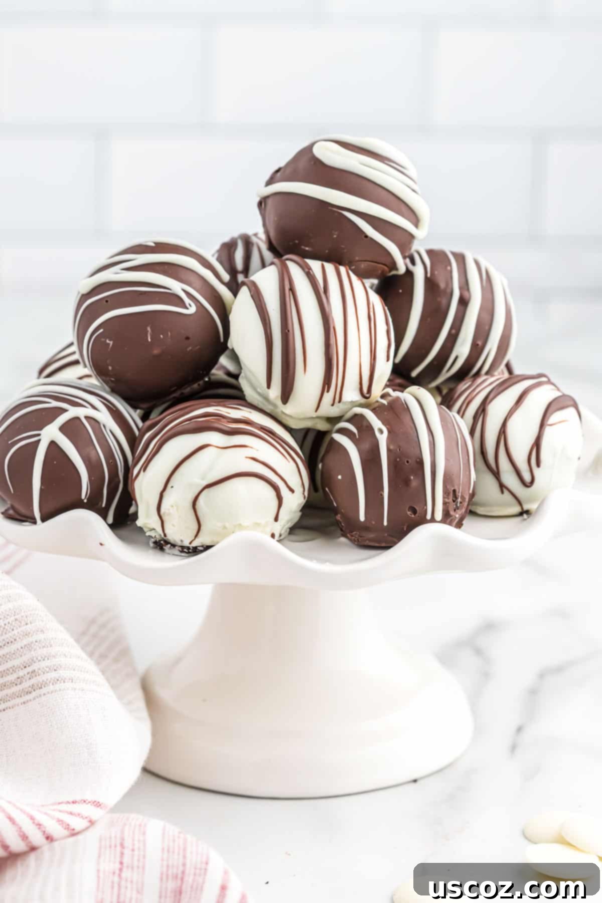 Oreo Truffles 13 Another appealing shot of Oreo balls on a serving plate, highlighting their perfect spherical shape and delectable appearance.