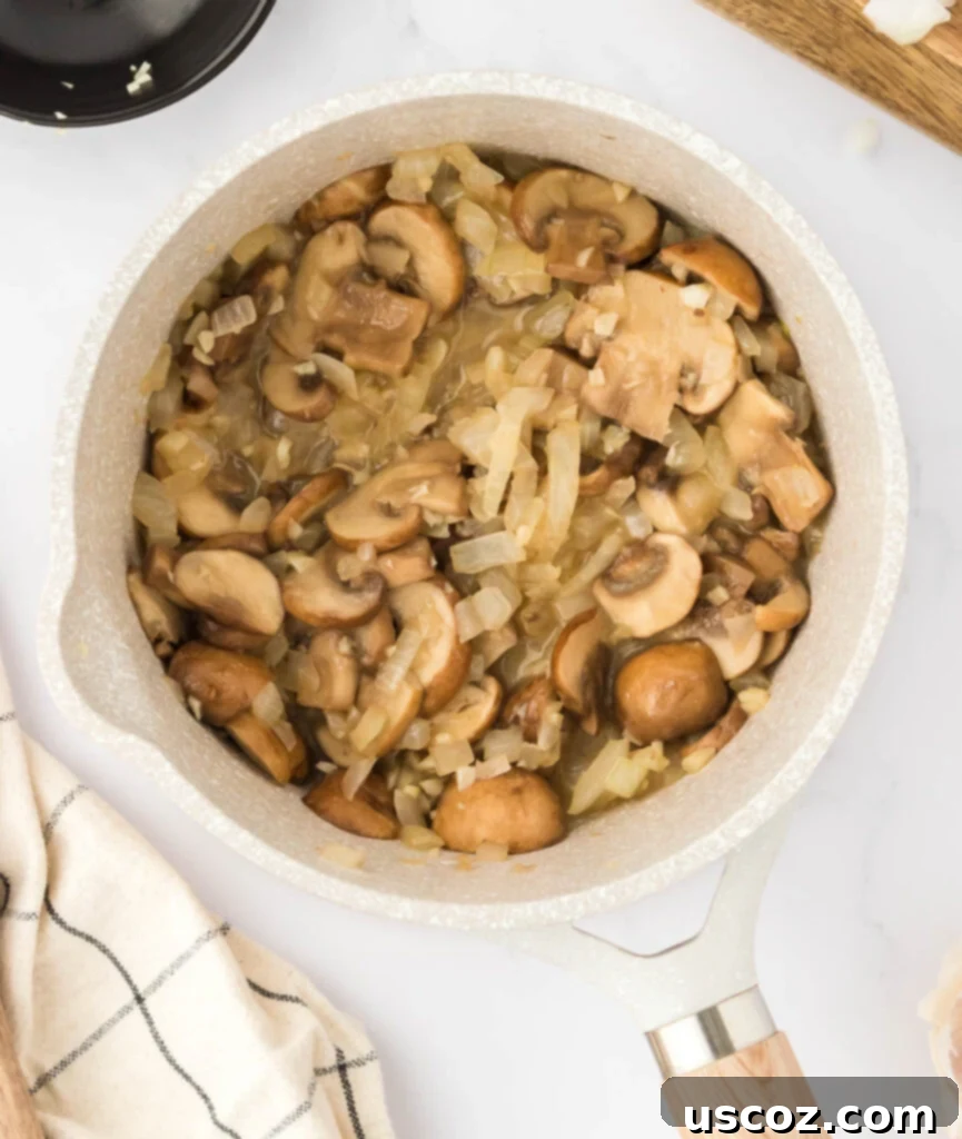 Perfect Vegetarian Gravy 8 Sautéed mushrooms, onions, and garlic in a saucepan, cooked down and softened, releasing their rich aromas.