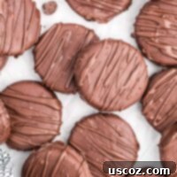 Decadent Chocolate Dipped Oreos 11 chocolate covered oreos on wax paper