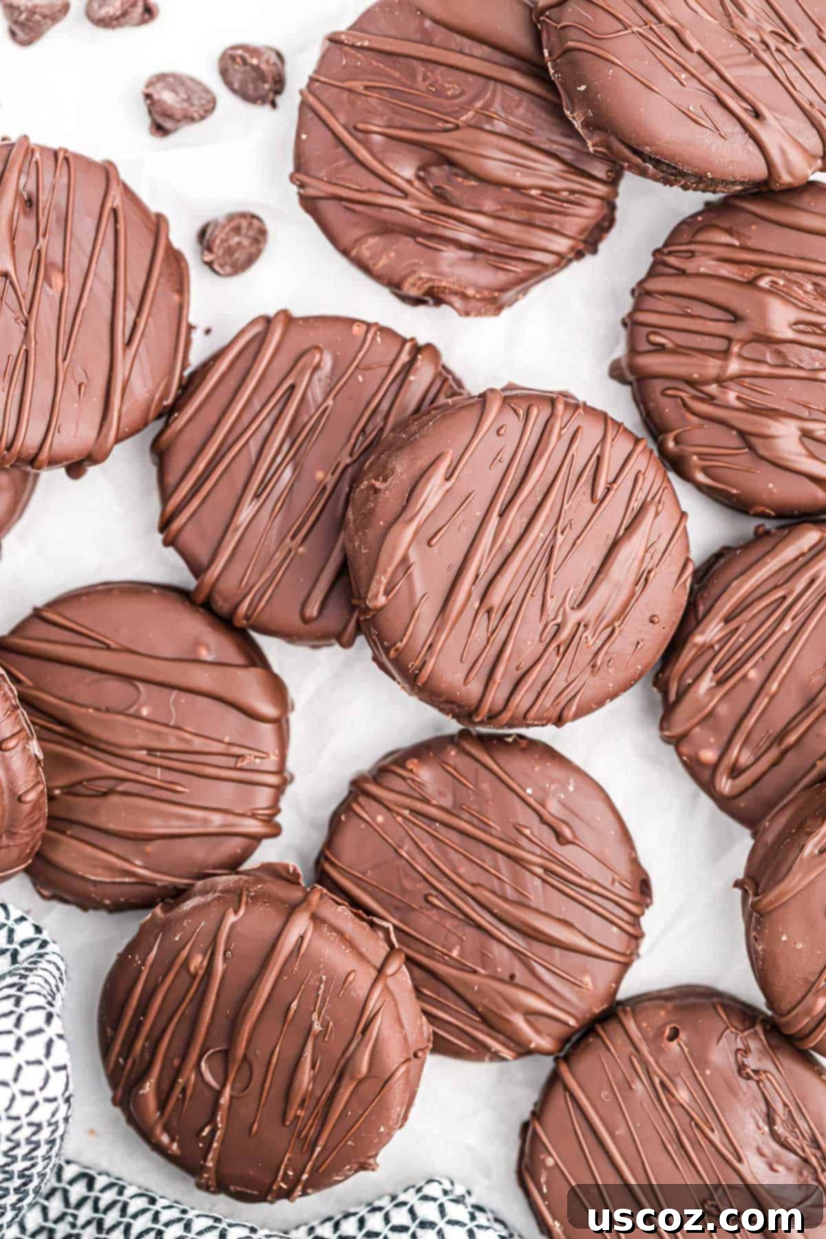 Decadent Chocolate Dipped Oreos 3 chocolate covered oreos on wax paper