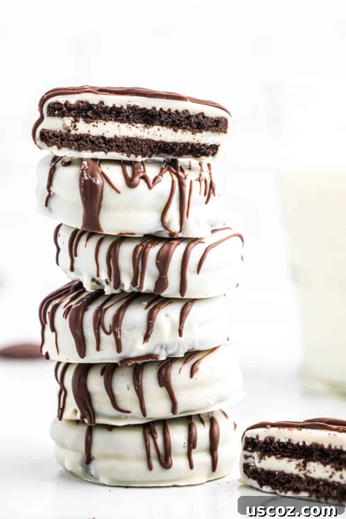 Decadent White Chocolate Oreos 2 white chocolate covered oreos stacked