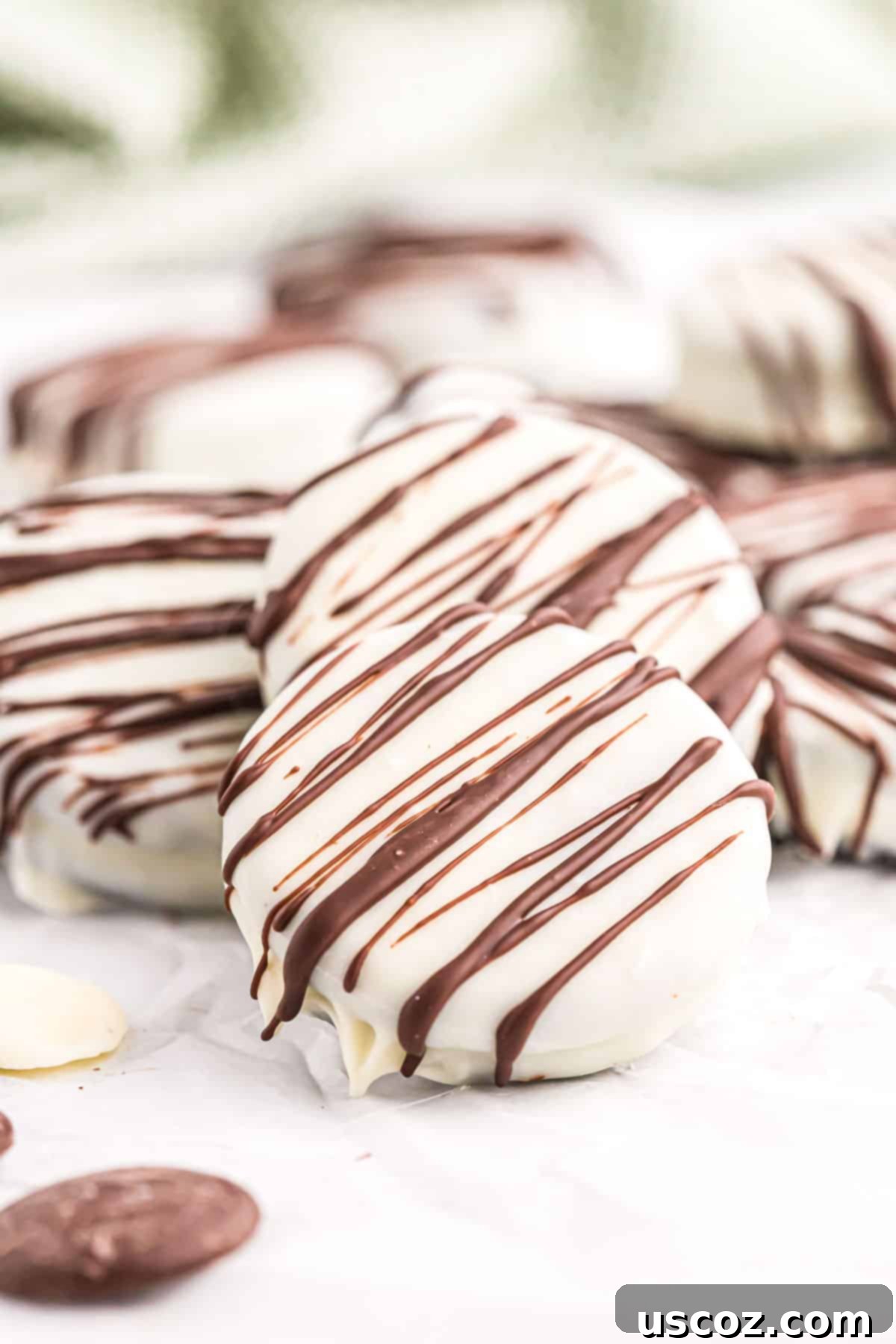 Decadent White Chocolate Oreos 3 white chocolate covered Oreos drizzled with dark chocolate