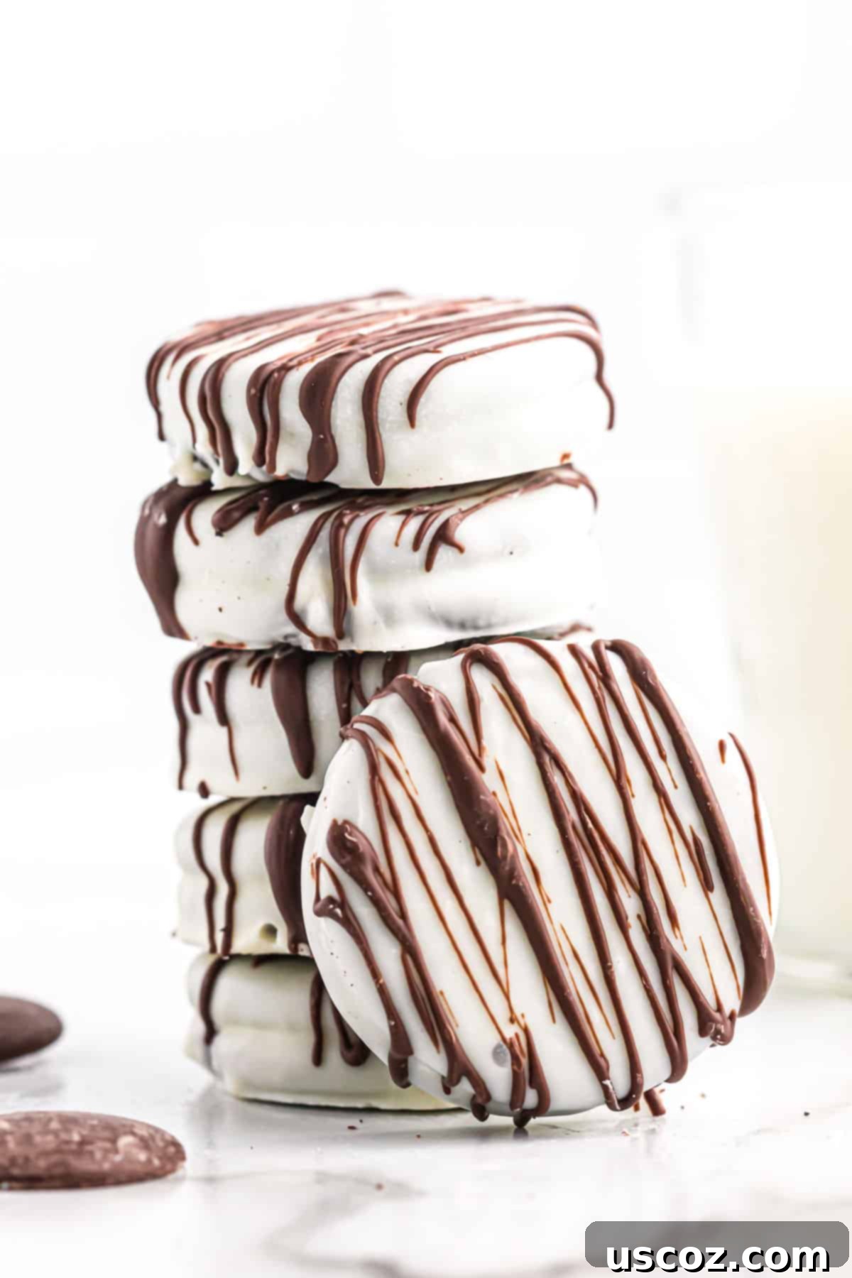 Decadent White Chocolate Oreos 8 white chocolate covered oreos stacked