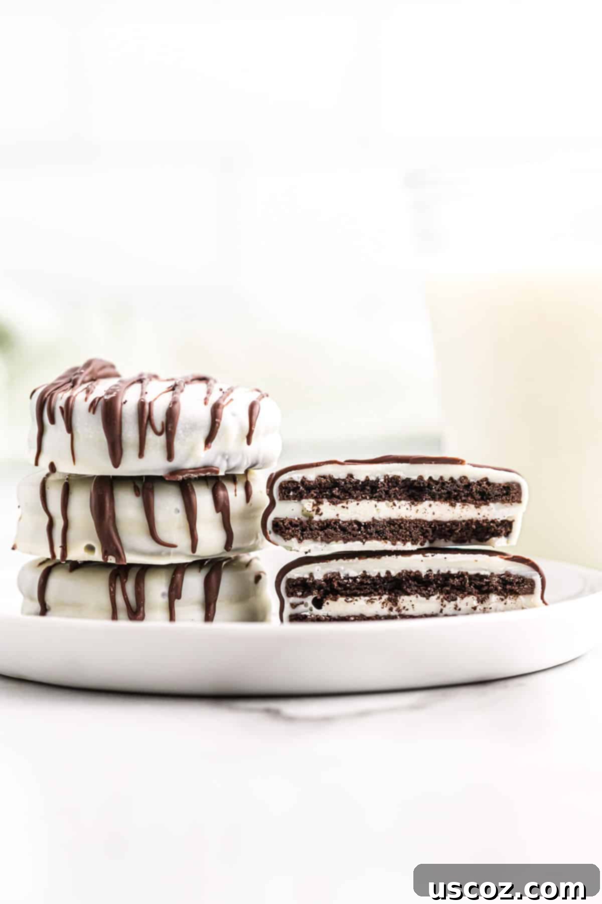 Decadent White Chocolate Oreos 9 white chocolate covered Oreos drizzled with dark chocolate