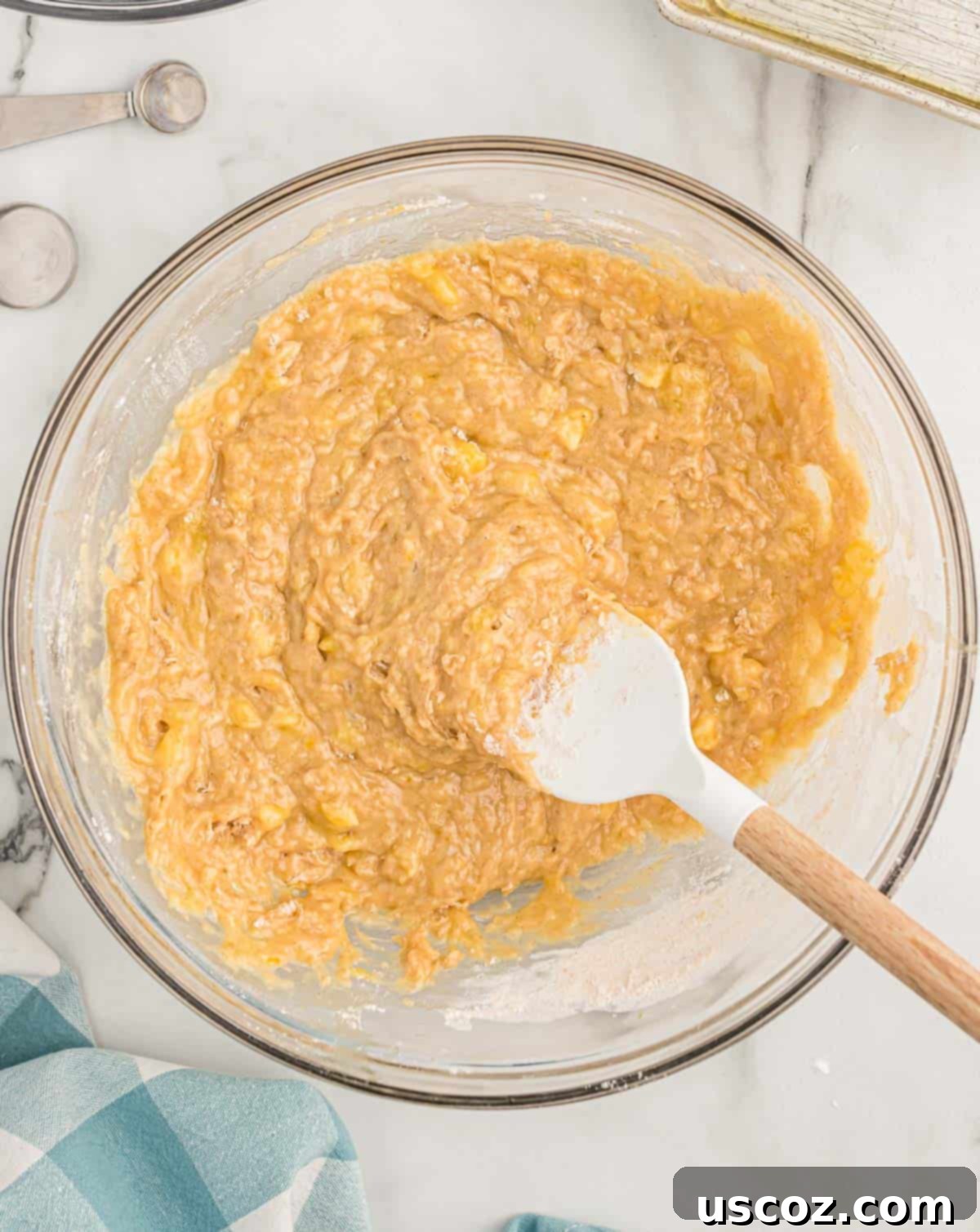 Ultimate Moist Banana Bread 12 Classic banana bread batter perfectly mixed and ready for the oven in a mixing bowl.