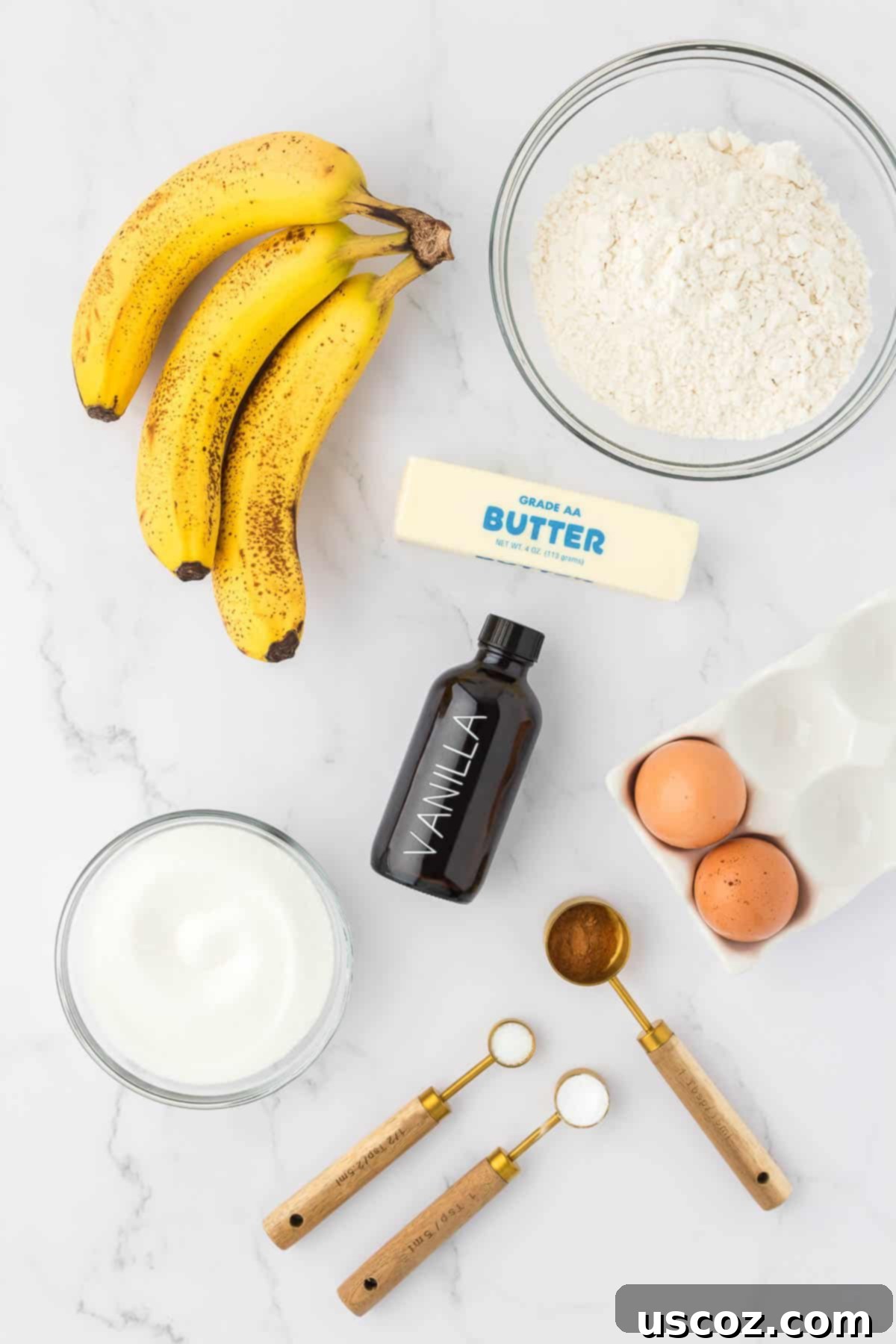 Ultimate Moist Banana Bread 5 All the dry and wet ingredients laid out neatly on a counter, ready for making classic banana bread.