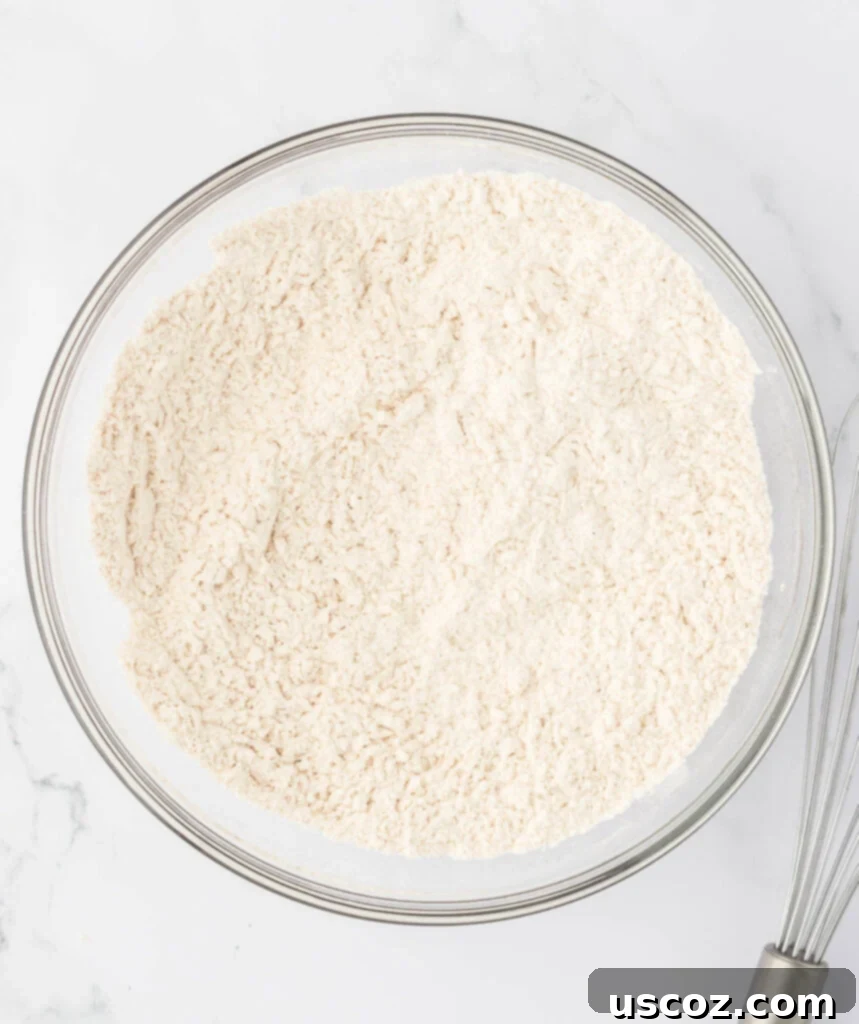 Ultimate Moist Banana Bread 10 Dry ingredients for banana bread thoroughly mixed together in a bowl.