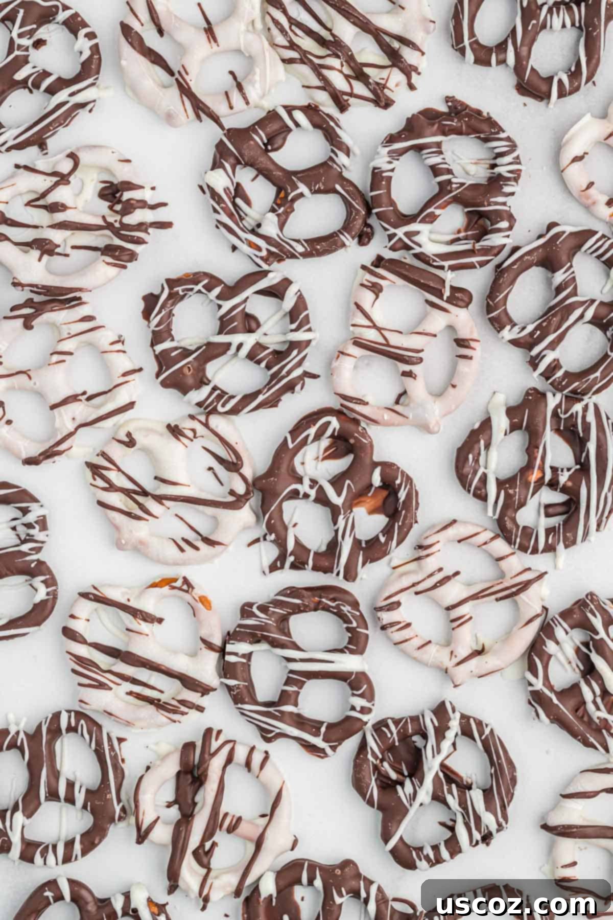Chocolate Pretzel Perfection 11 A close-up shot of several chocolate covered pretzels, highlighting their perfect coating and appealing texture.