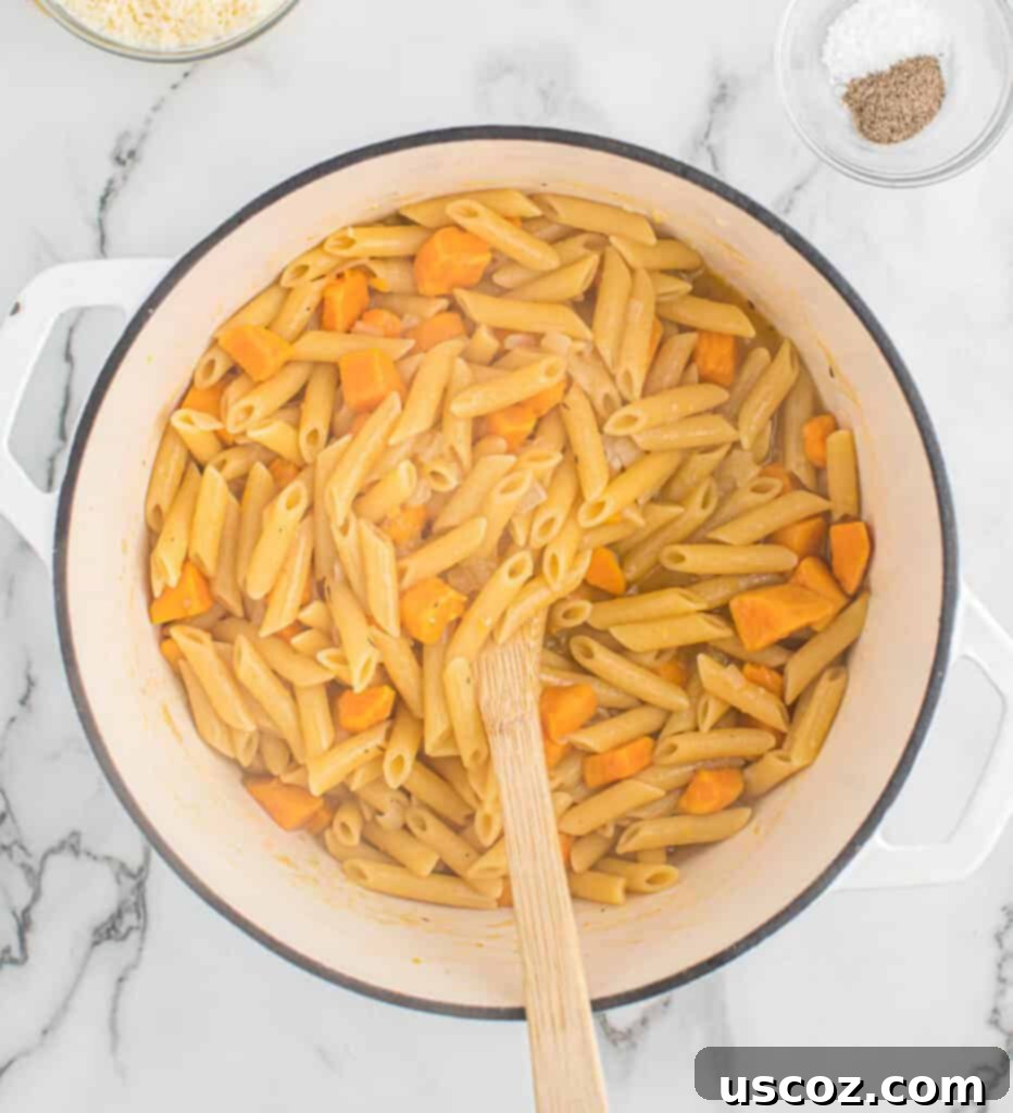 Golden Sweet Potato Strands 6 sweet potato pasta being stirred in the pot