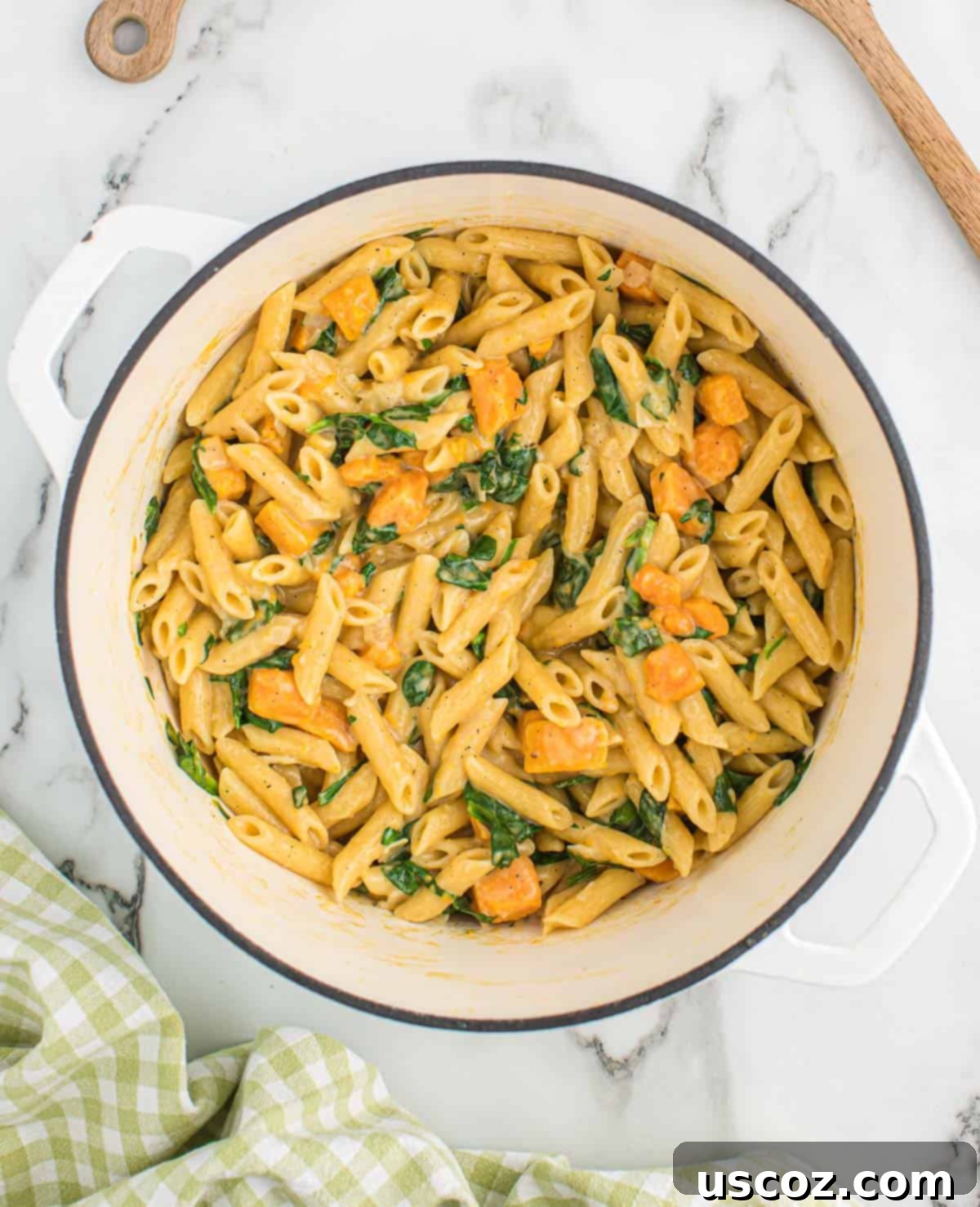 Golden Sweet Potato Strands 10 finished sweet potato pasta in a white dutch oven
