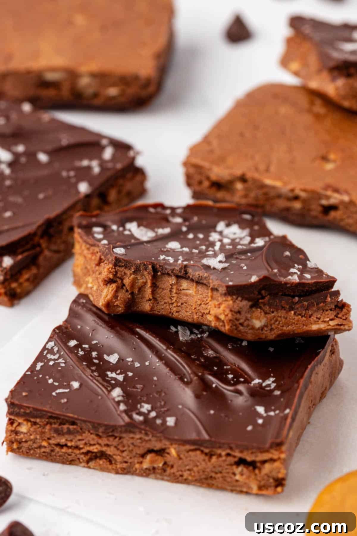 Protein-Packed Chocolate Bars 11 Freshly cut homemade chocolate protein bars arranged on a serving plate