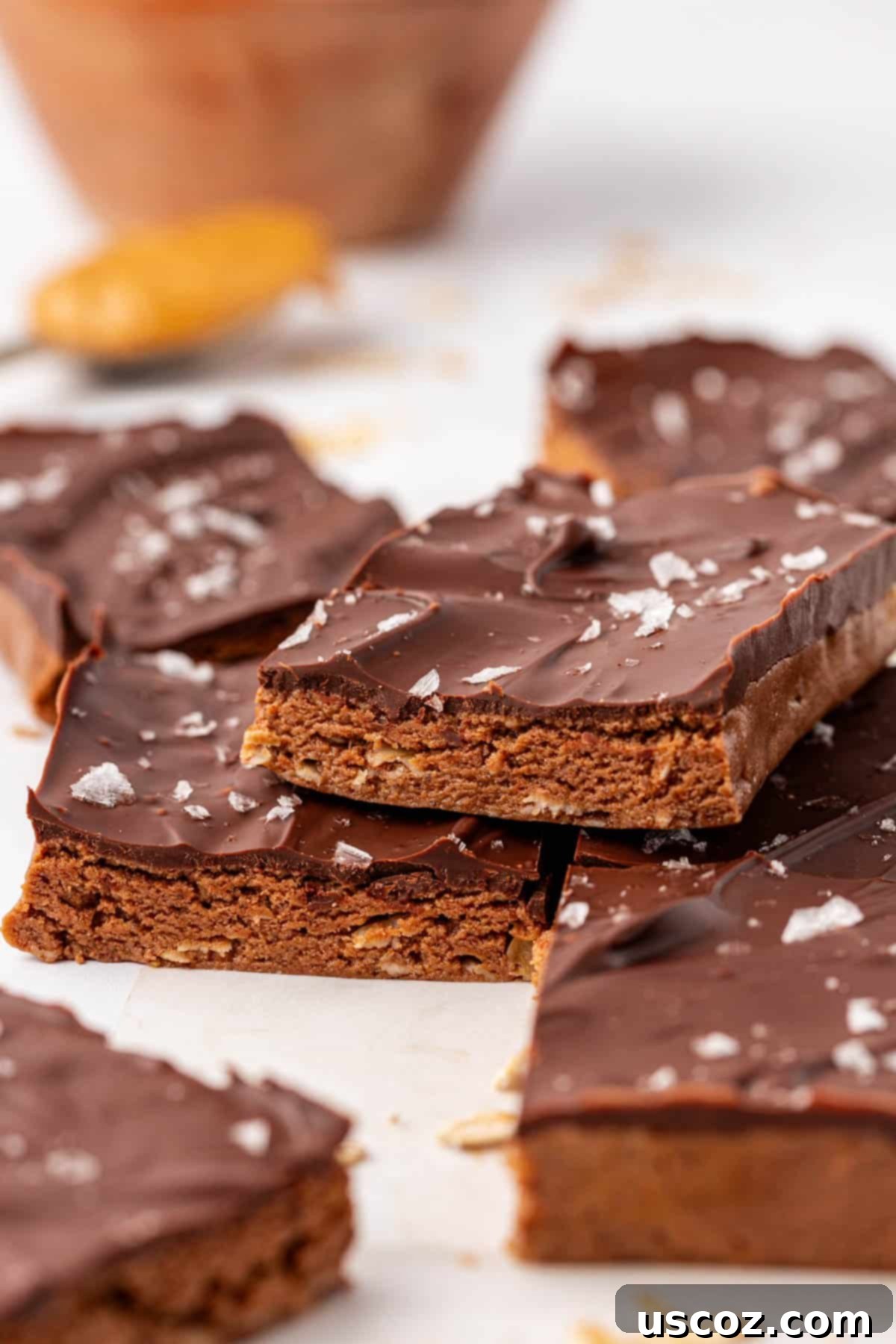 Protein-Packed Chocolate Bars 13 An inviting arrangement of chocolate protein bars on a rustic wooden surface, highlighting their homemade appeal