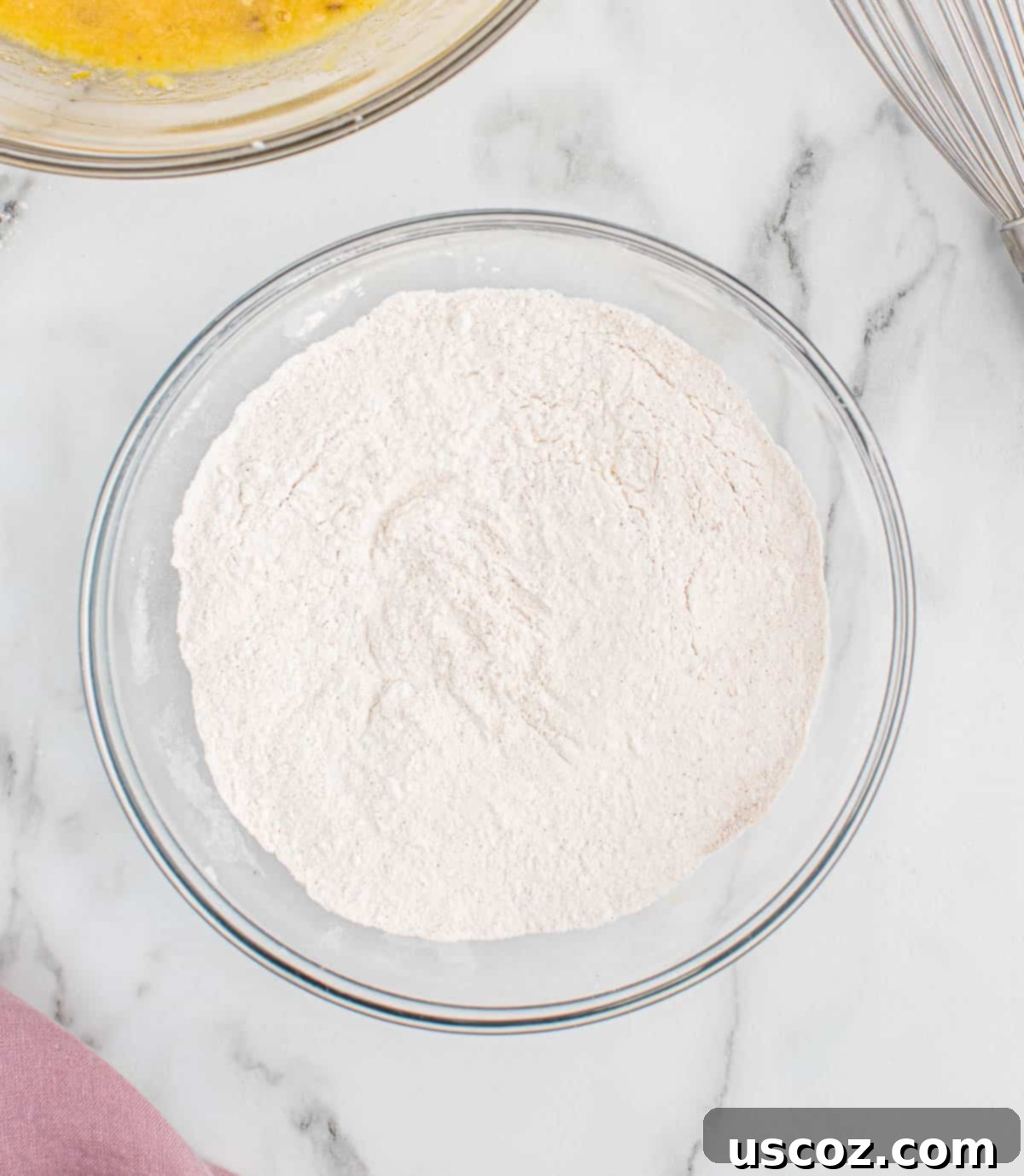 Foolproof Banana Bread Muffins 7 dry ingredients in a mixing bowl
