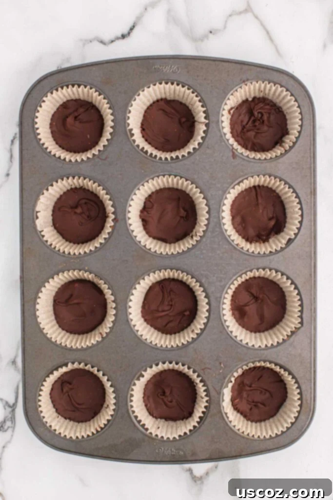 Homemade Peanut Butter Cups 7 melted chocolate in muffin tin liners