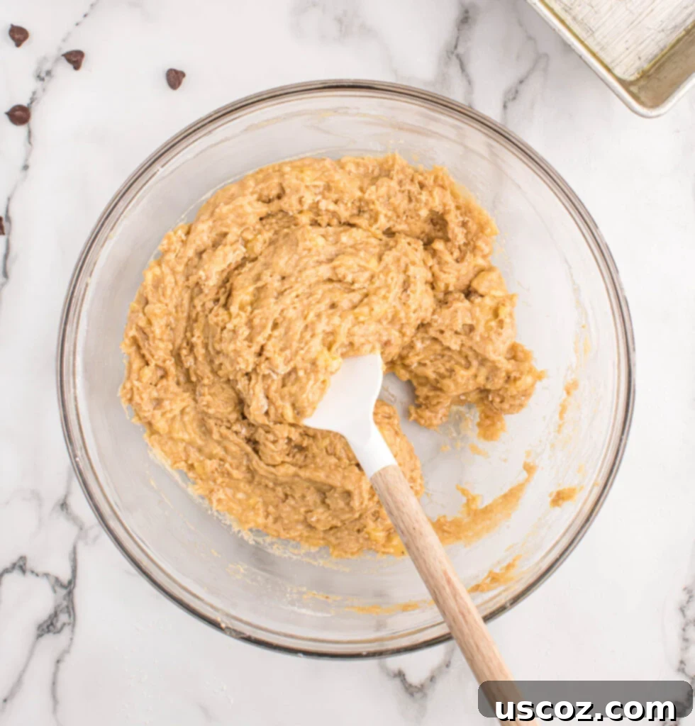 The Ultimate Chocolate Chip Banana Bread 6 Banana bread batter in a mixing bowl