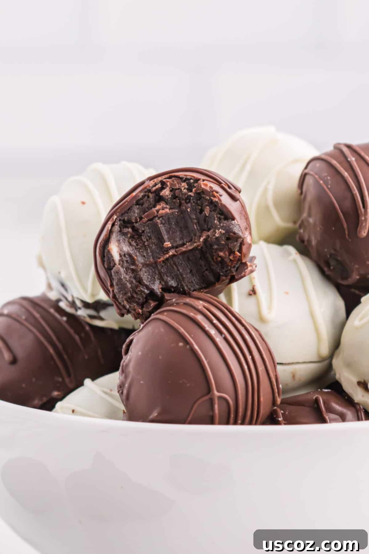 Minty Oreo Truffle Bites 13 more oreo balls on a dessert platter