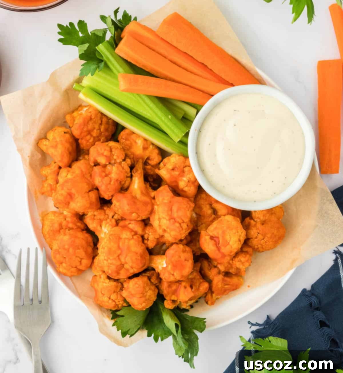 Air Fryer Buffalo Cauliflower Wings 14 buffalo cauliflower bites with celery, carrots, and ranch