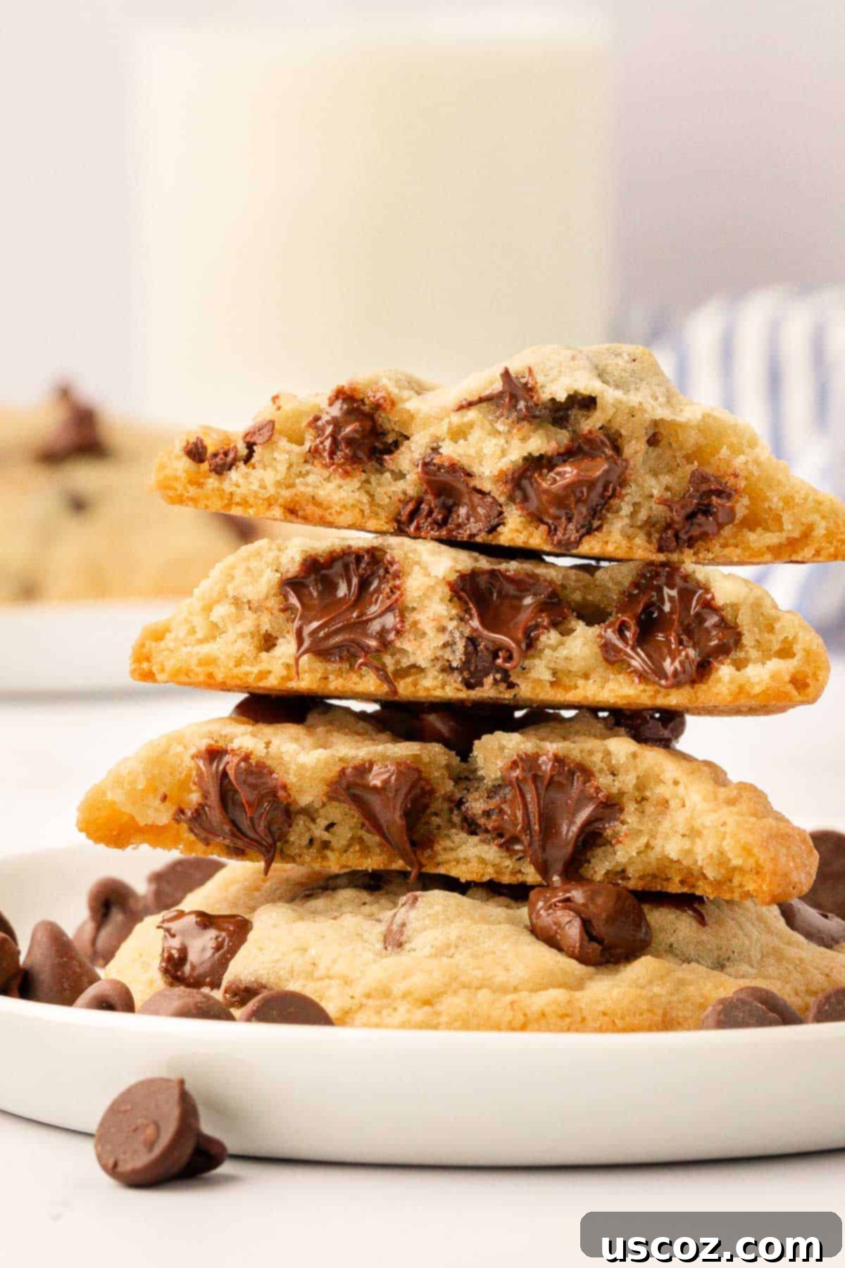 Golden Crisp Chocolate Chip Cookies 3 chocolate chip cookies broken open to show the melted chocolate chips