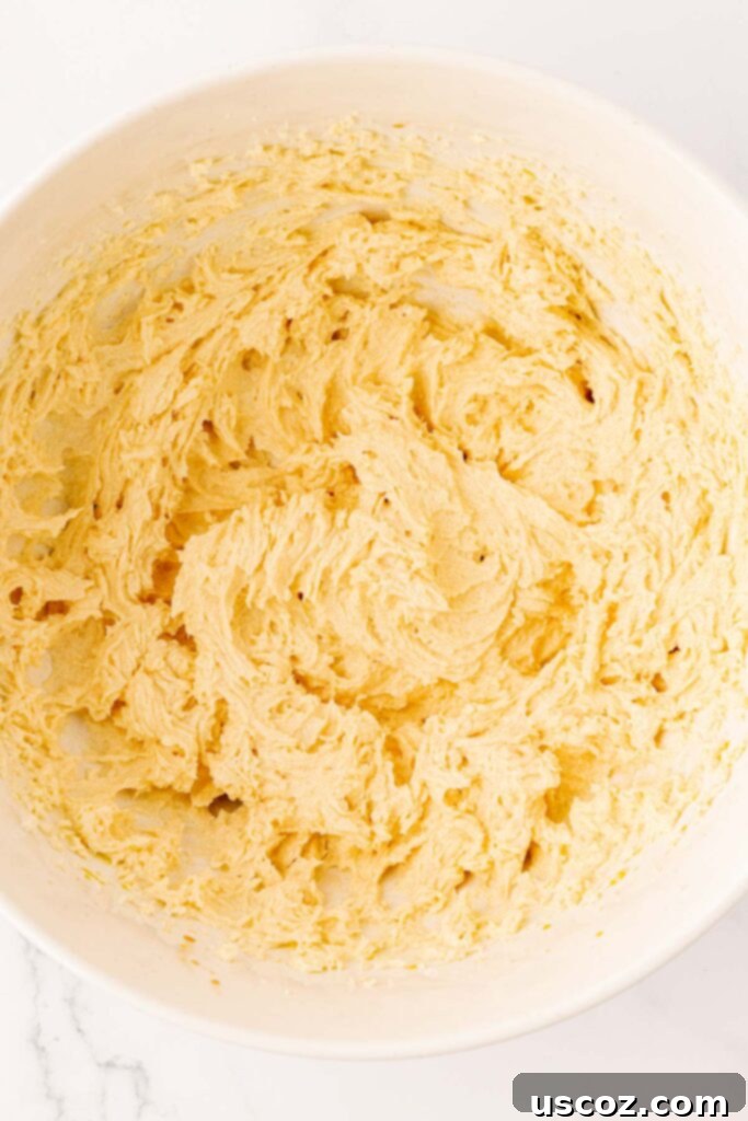 Golden Crisp Chocolate Chip Cookies 10 cookie dough wet ingredients in a mixing bowl