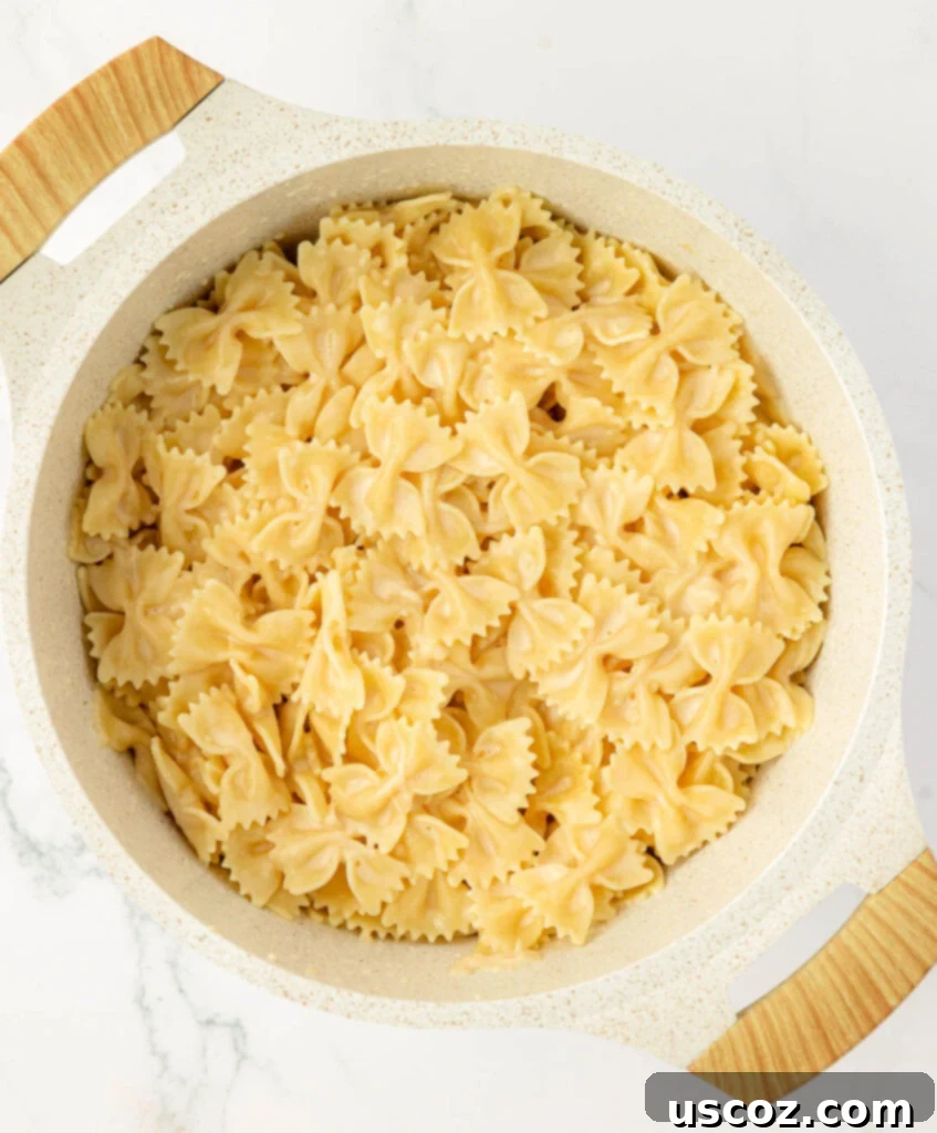 Farfalle 12 creamy bow tie noodles in a pan