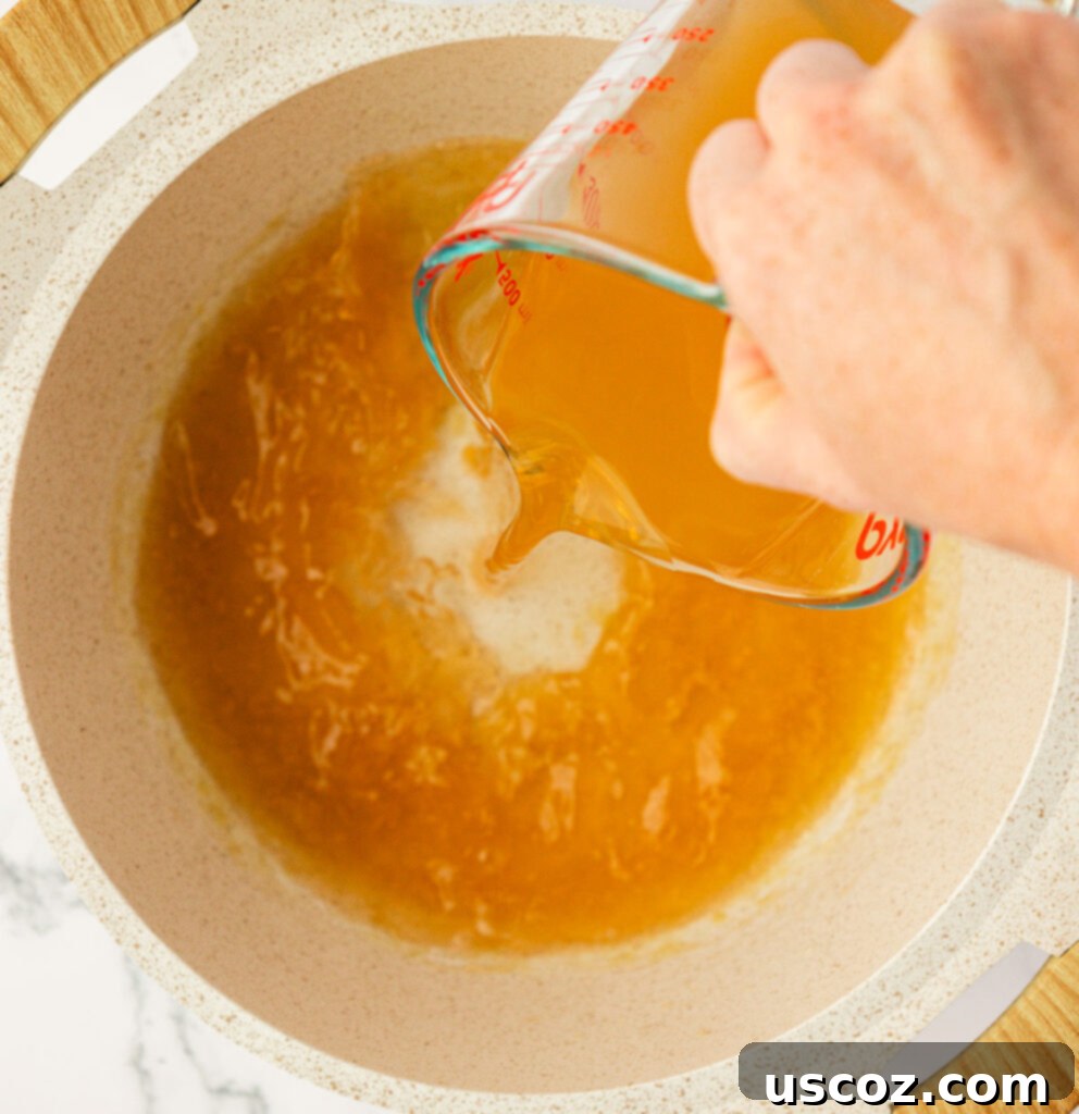 Farfalle 8 pouring vegetable broth
