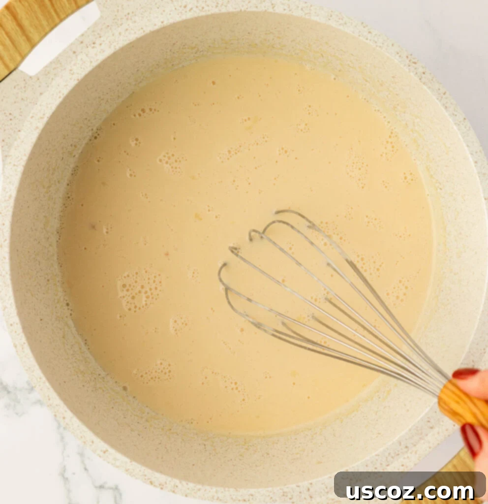 Farfalle 10 whisking the cream sauce
