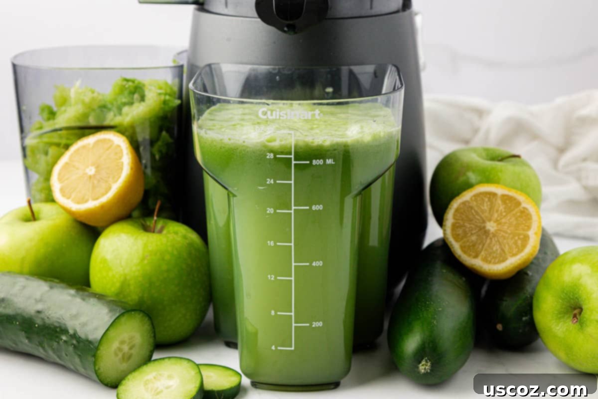 Cool Cucumber Elixir 3 cucumber juice in front of the juicer