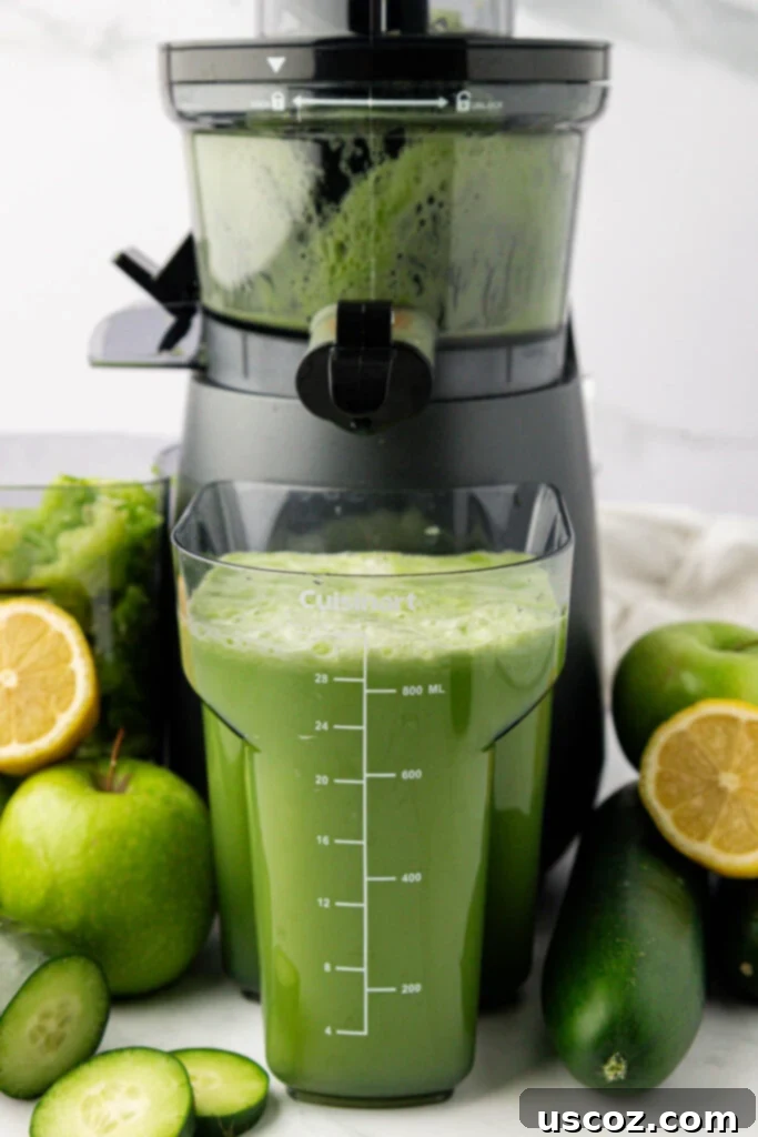 Cool Cucumber Elixir 6 cucumber juice in front of the juicer