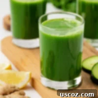 Emerald Elixir 13 kale juice in a glass