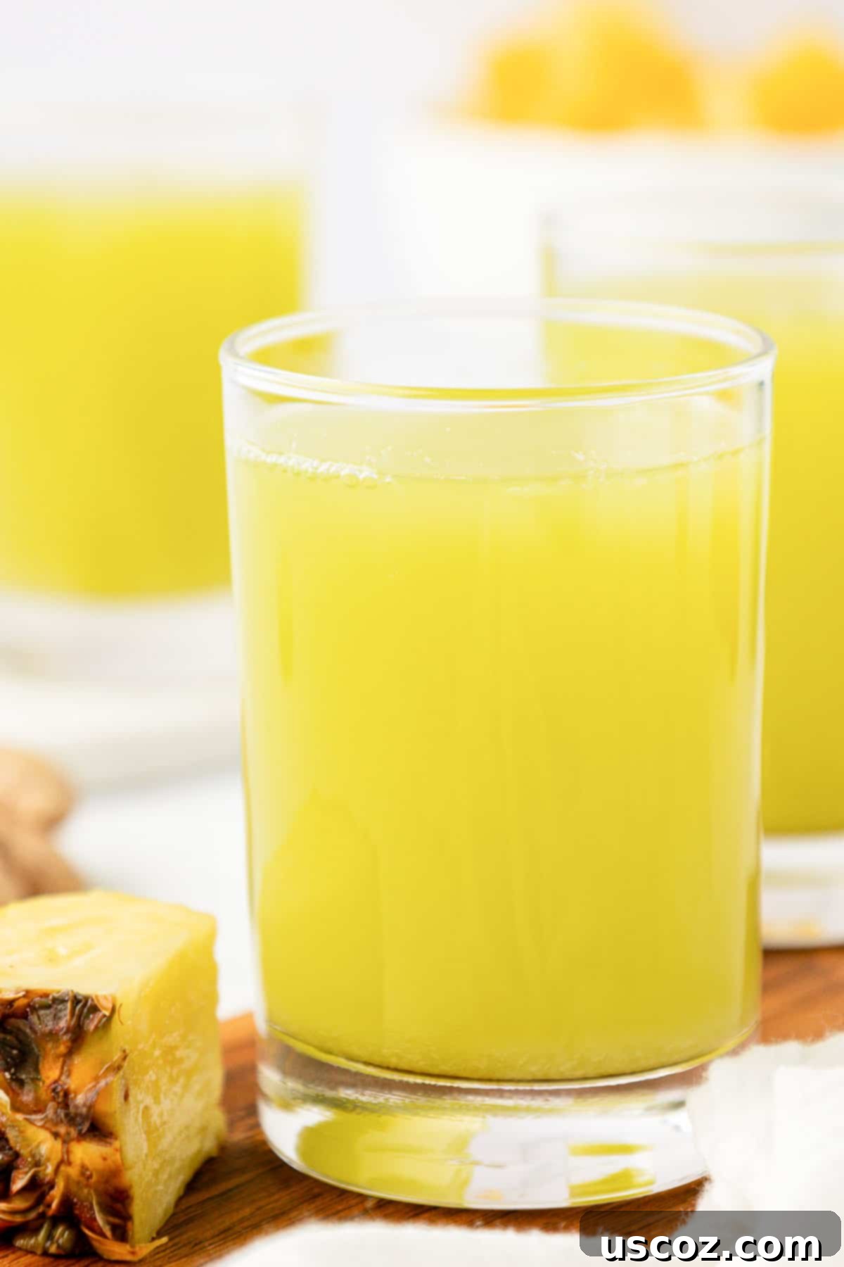 Hydrating Pineapple Cucumber Quencher 2 pineapple cucumber juice in a glass