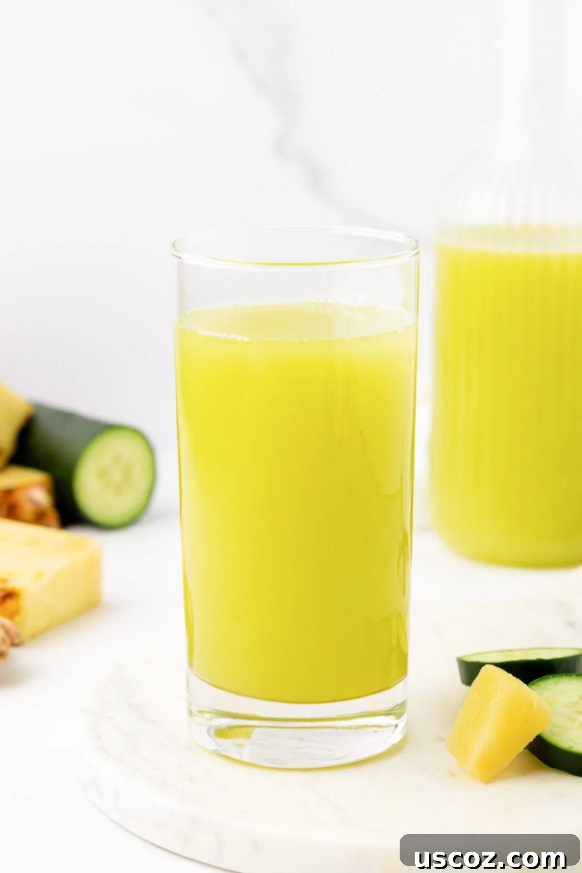 Hydrating Pineapple Cucumber Quencher 8 pineapple cucumber juice in a glass