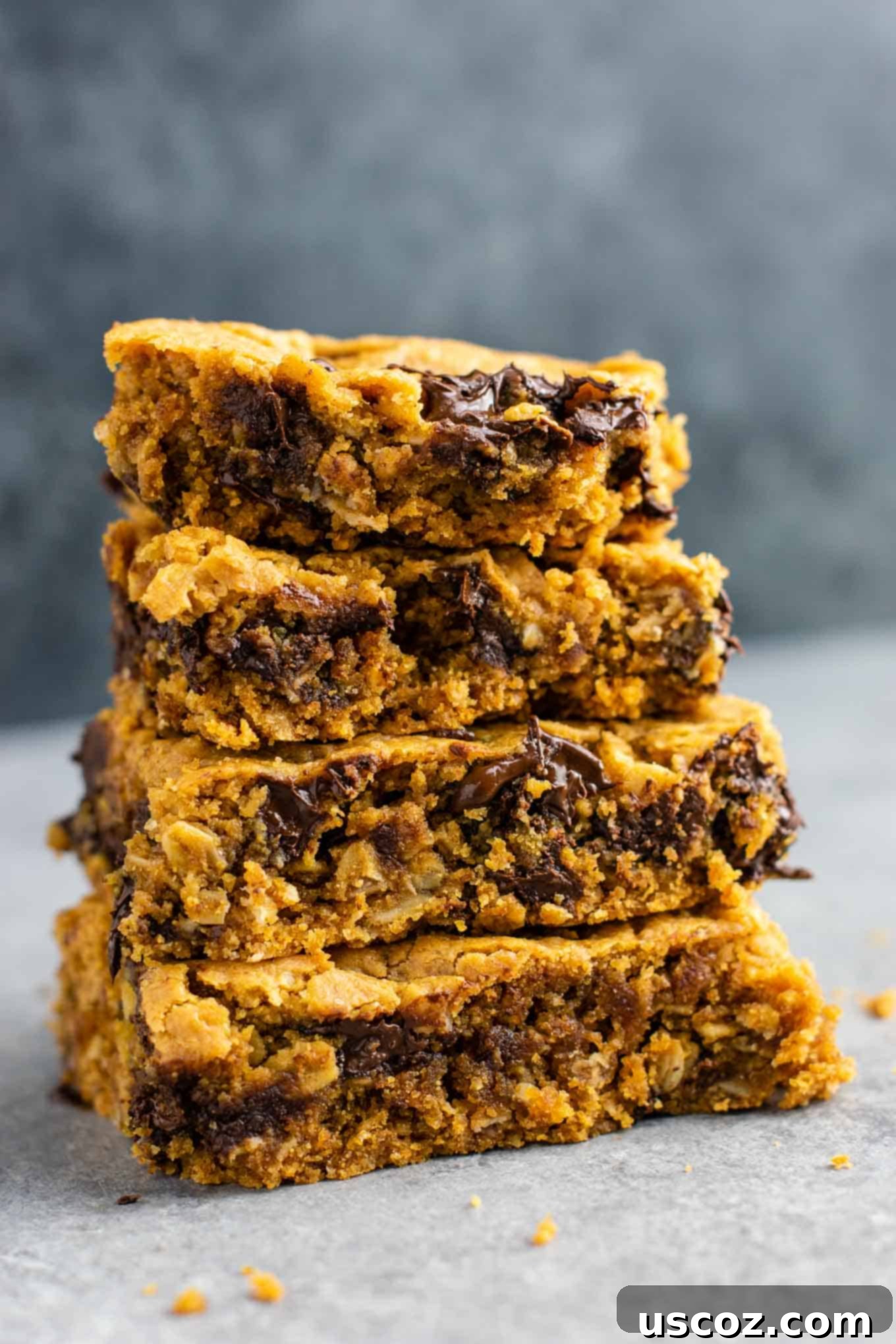 The Best Gluten-Free Cookie Bars 6 Several Gluten-Free Peanut Butter Chocolate Chip Cookie Bars arranged beautifully, emphasizing their wholesome and appealing look. These secretly healthy and dairy-free desserts are perfect for any occasion. #glutenfree #cookiebars #dessert #dairyfree #healthydessert #glutenfreedessert #glutenfreerecipe #glutenfreecookiebars