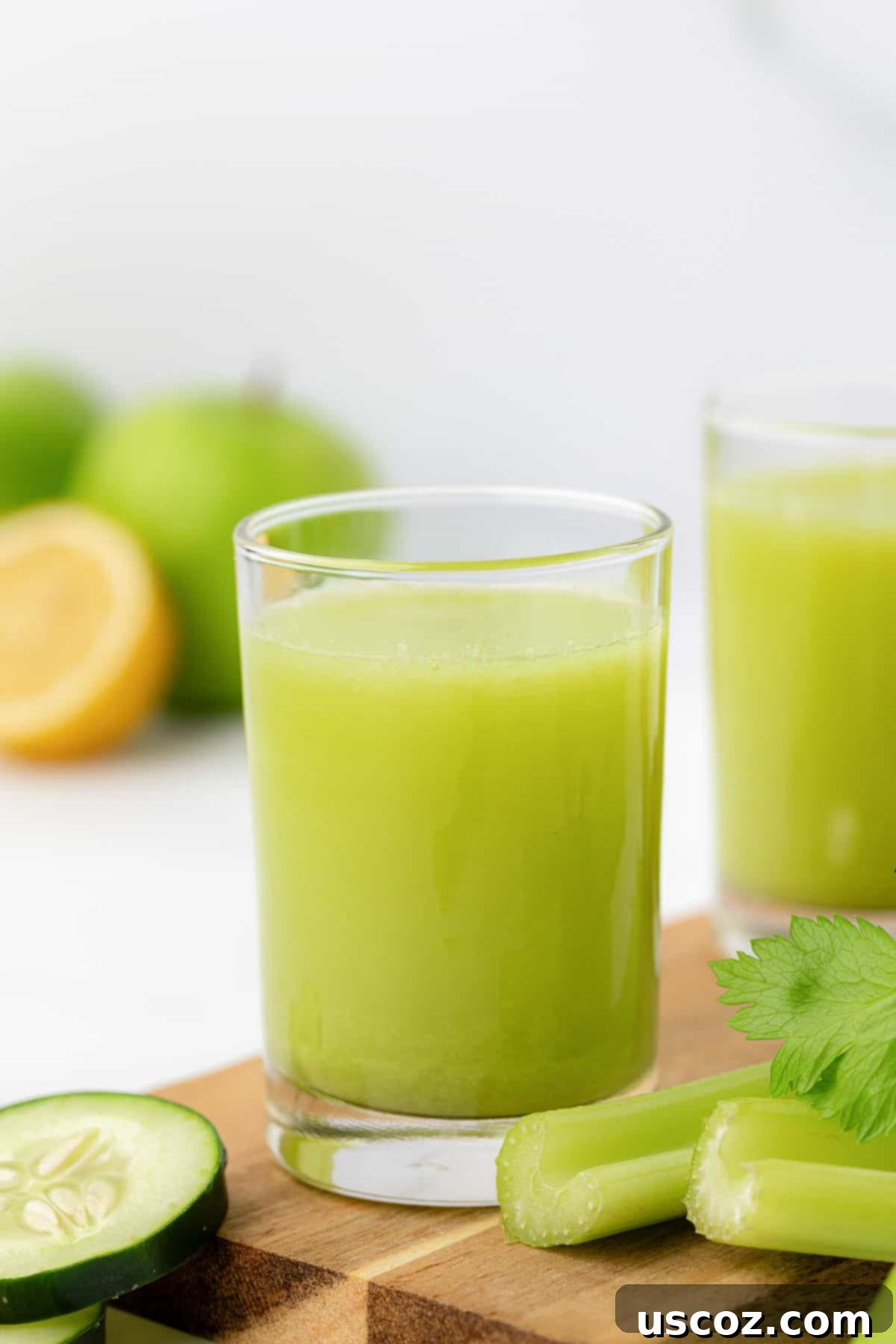 Celery Juice 2 Celery juice in a glass, garnished with a celery stalk