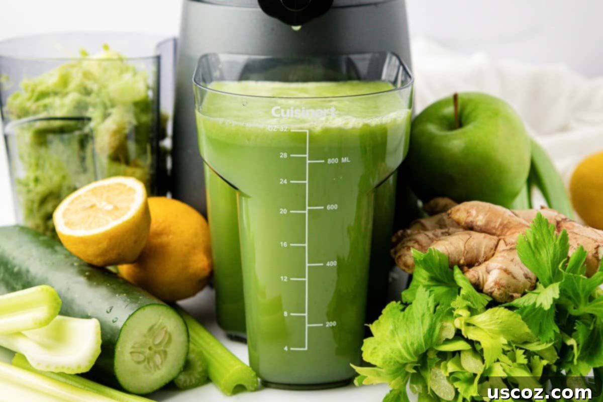 Celery Juice 3 Celery juice being prepared next to a juicer