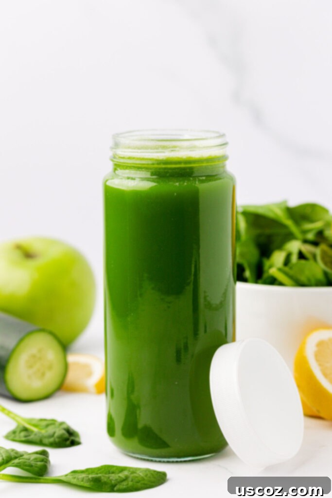 Vibrant Green Elixir 9 Spinach juice stored in a small glass jar with a lid, ready for refrigeration