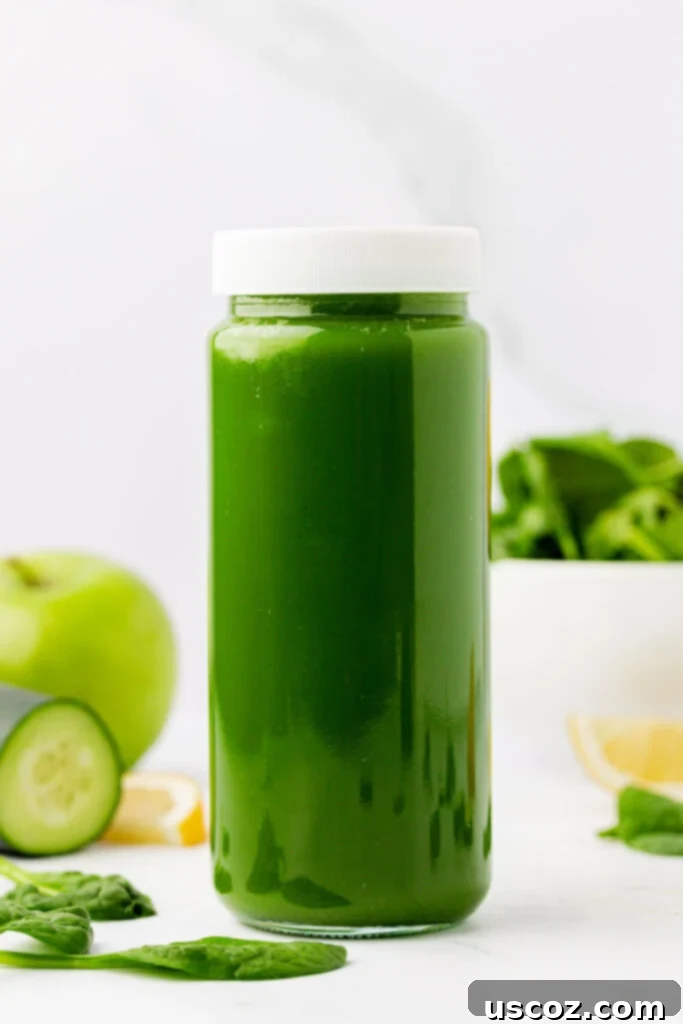 Vibrant Green Elixir 10 Another view of spinach juice in a glass storage jar with a lid