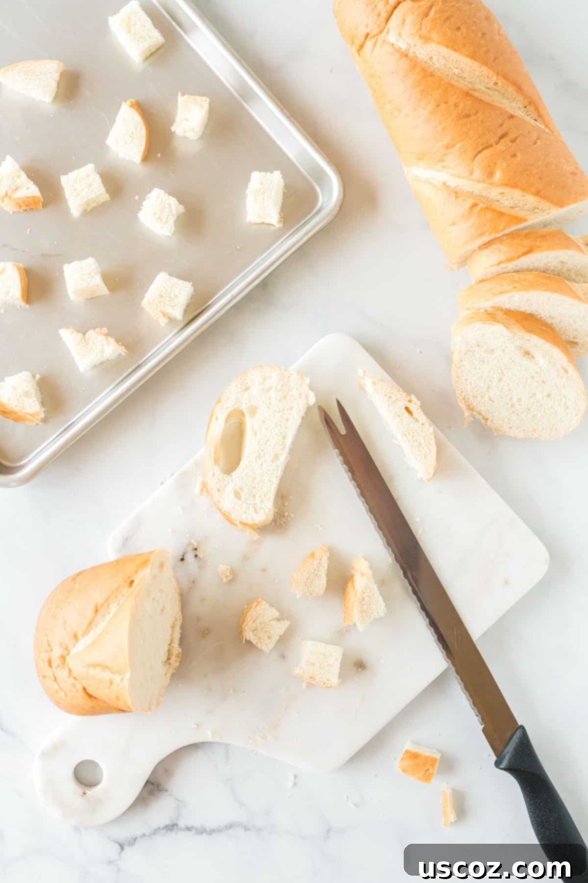 Cutting a loaf of bread into cubes for vegan stuffing