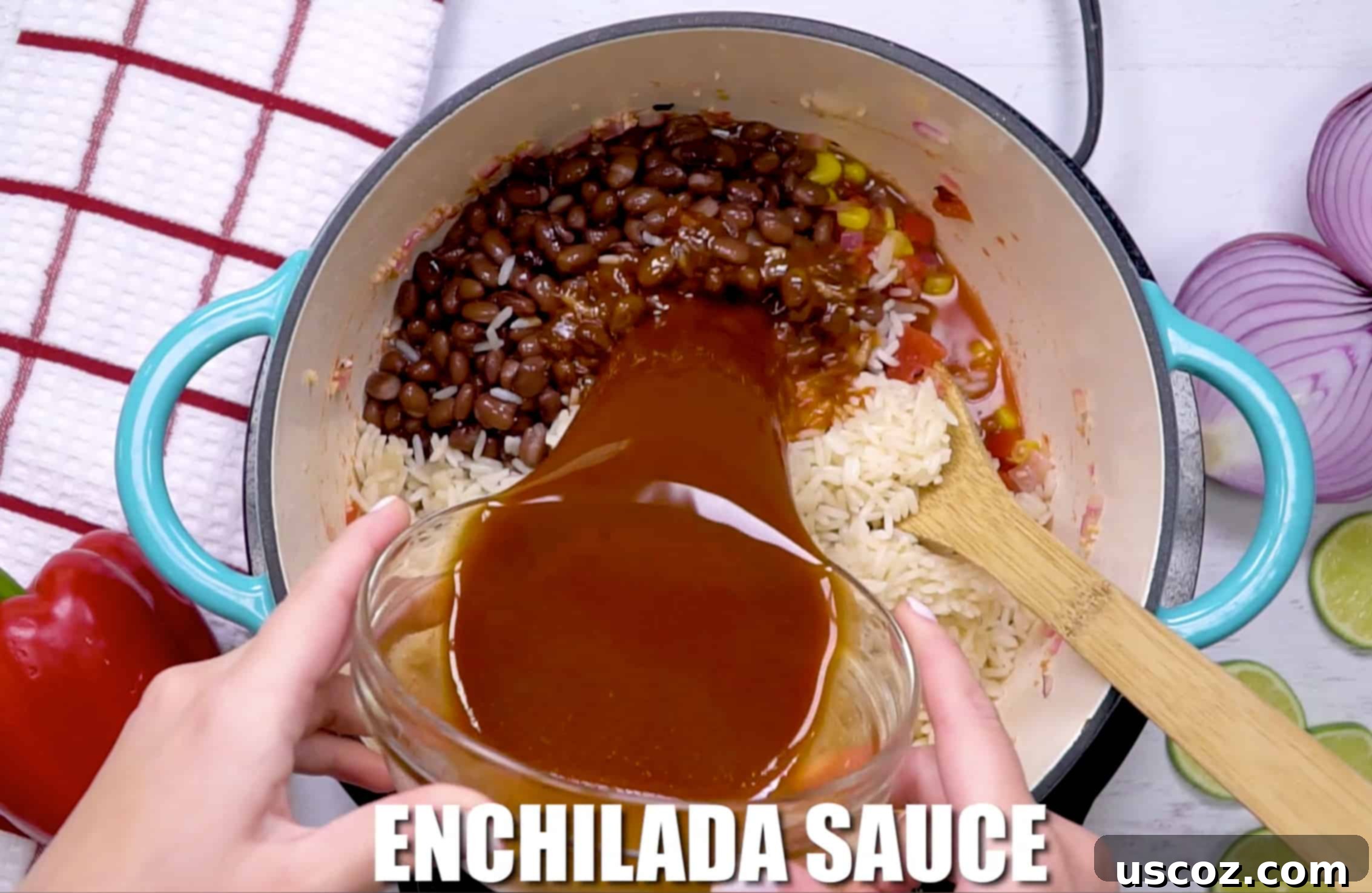 Hearty Vegetarian Mexican Bake 11 Adding enchilada sauce to the mexican rice casserole