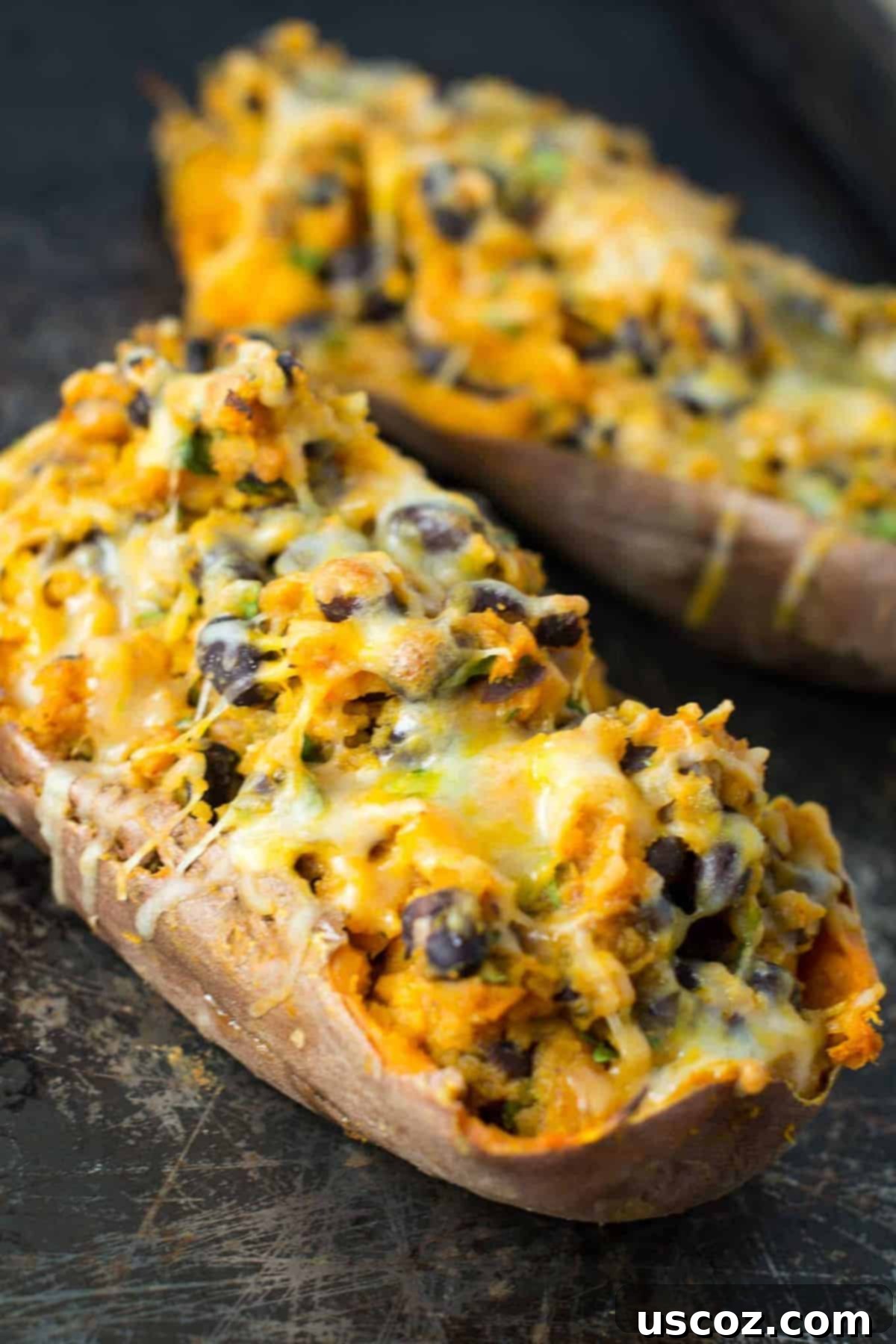 Vegetarian Mexican Sweet Potato Boats 2 vegetarian mexican stuffed sweet potatoes recipe via @buildyourbite