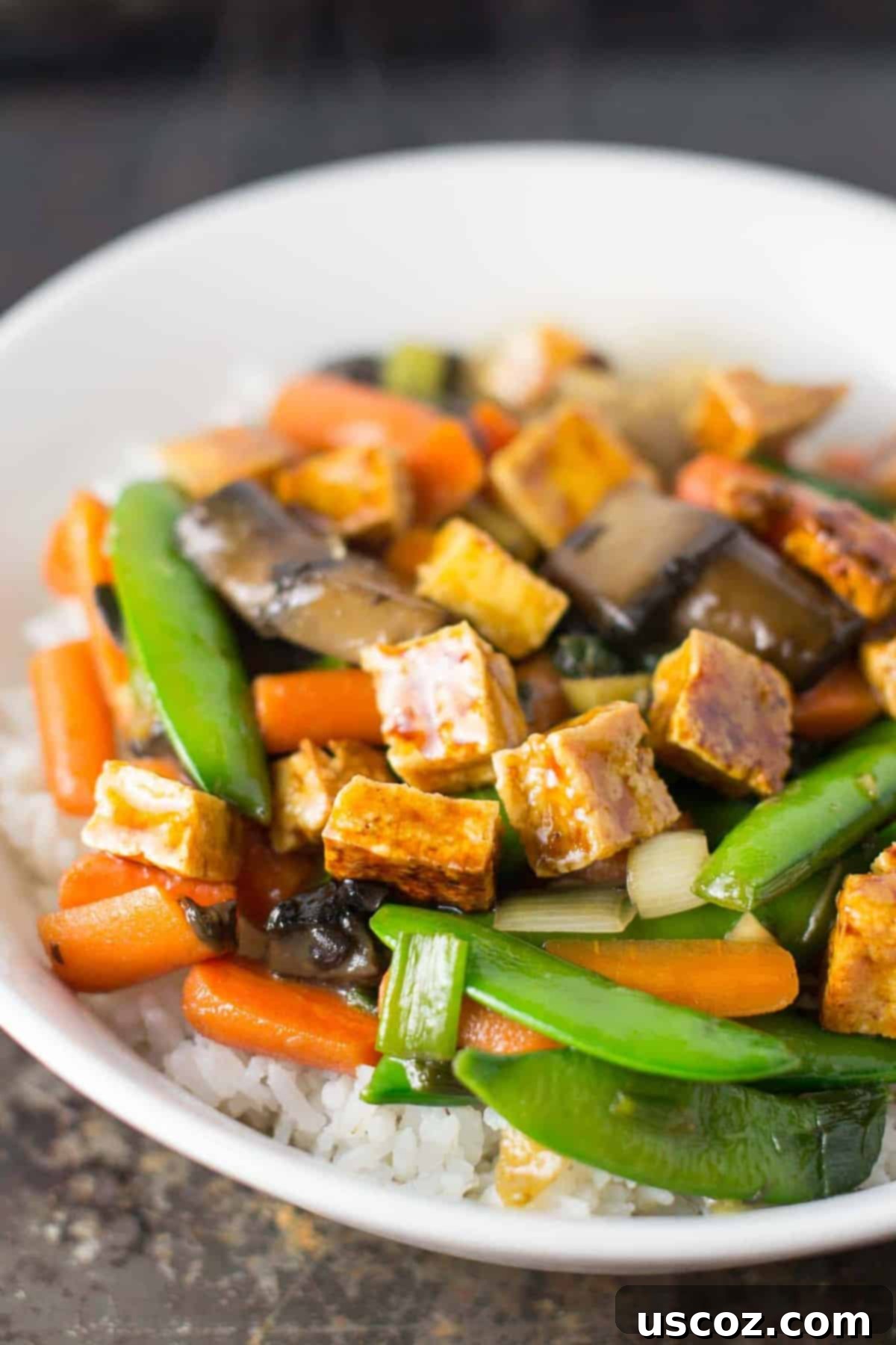 Golden Honey-Ginger Tofu Delight 5 Tray of golden, crispy baked tofu cubes, perfectly prepped for a delicious stir fry