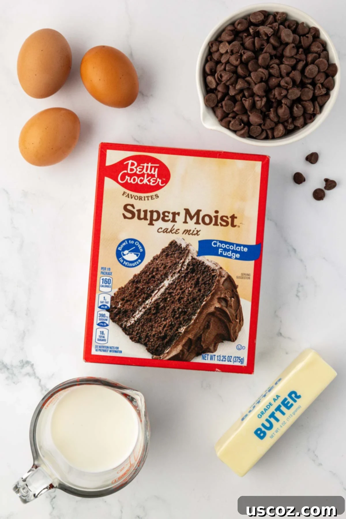 Irresistible Double Chocolate Cake Mix Muffins 4 cake mix, eggs, chocolate chips, milk, and melted butter laid out on a counter