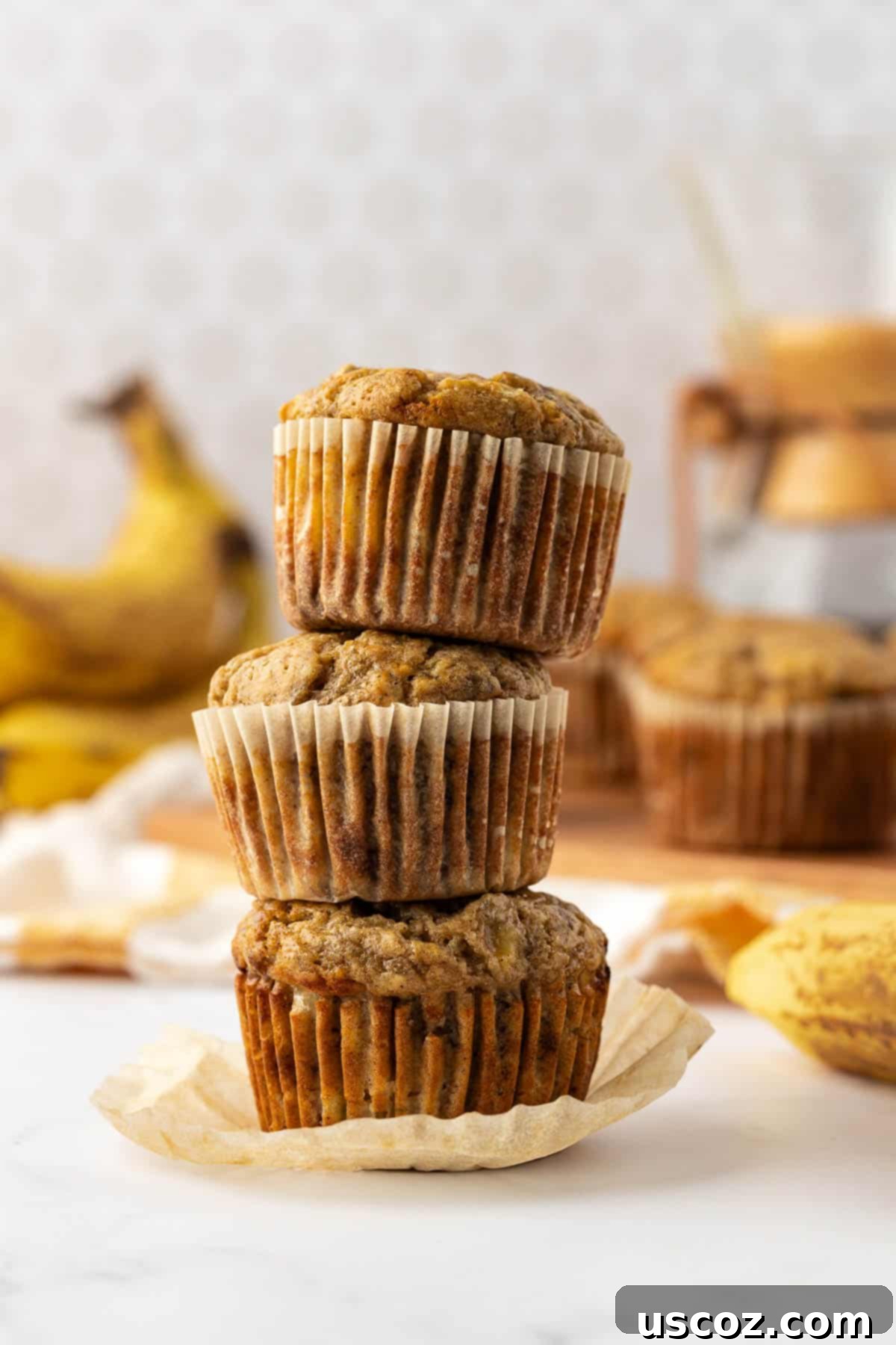 Deliciously Healthy Banana Muffins 13 banana muffins stacked