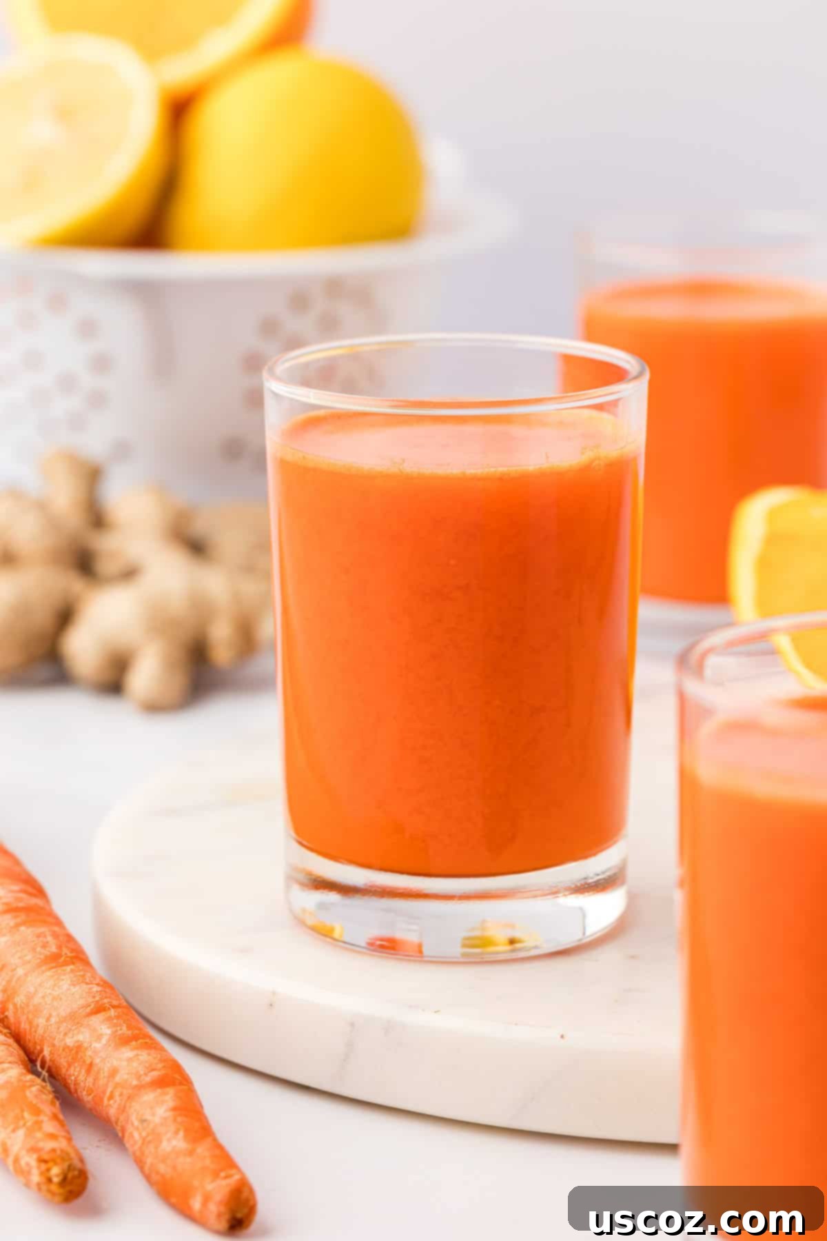 Golden Glow Juice 2 carrot orange juice in a glass