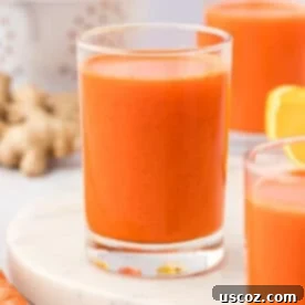 Golden Glow Juice 11 carrot orange juice in a glass