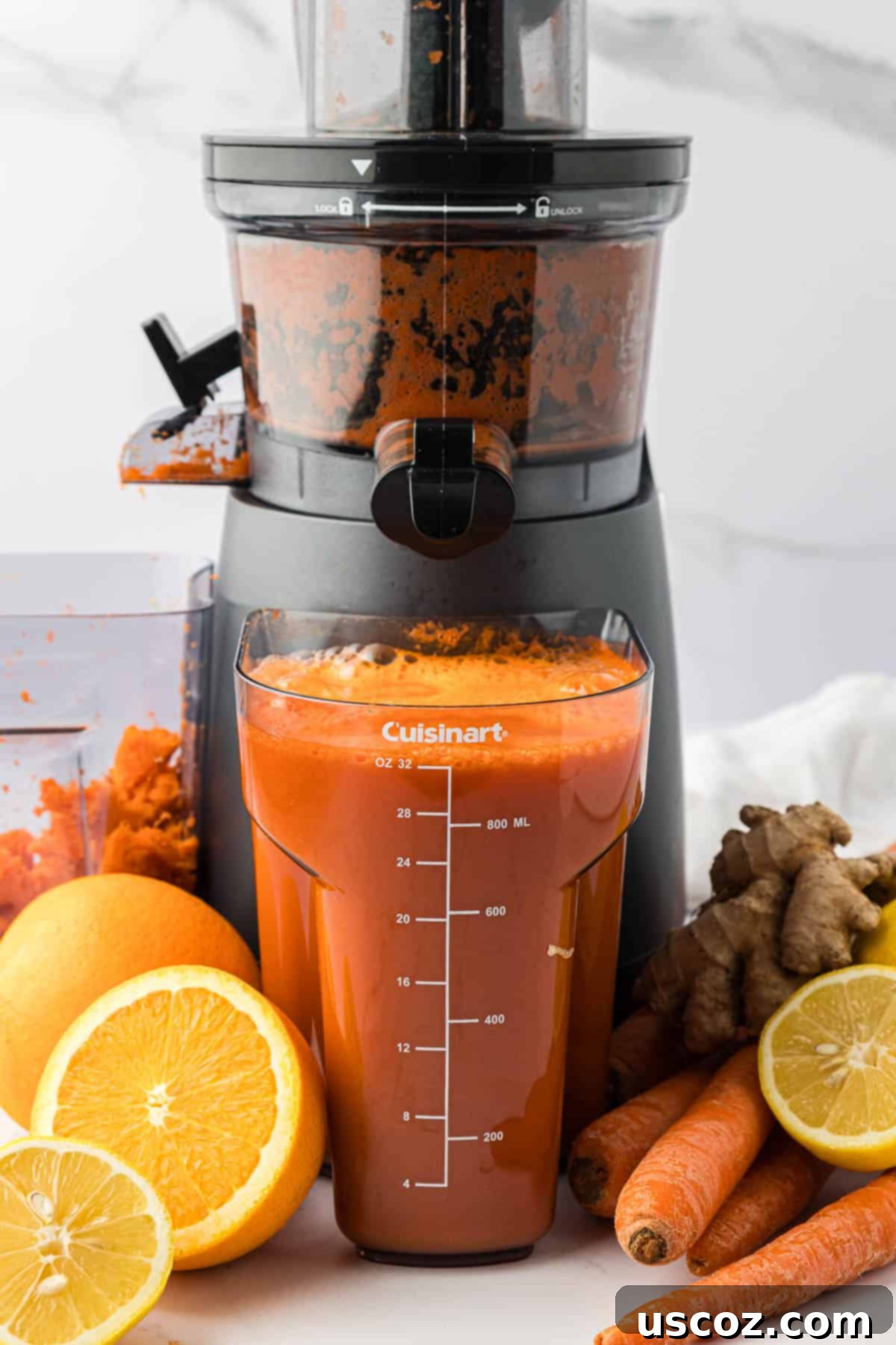 Golden Glow Juice 5 carrot orange juice in the juicing canister