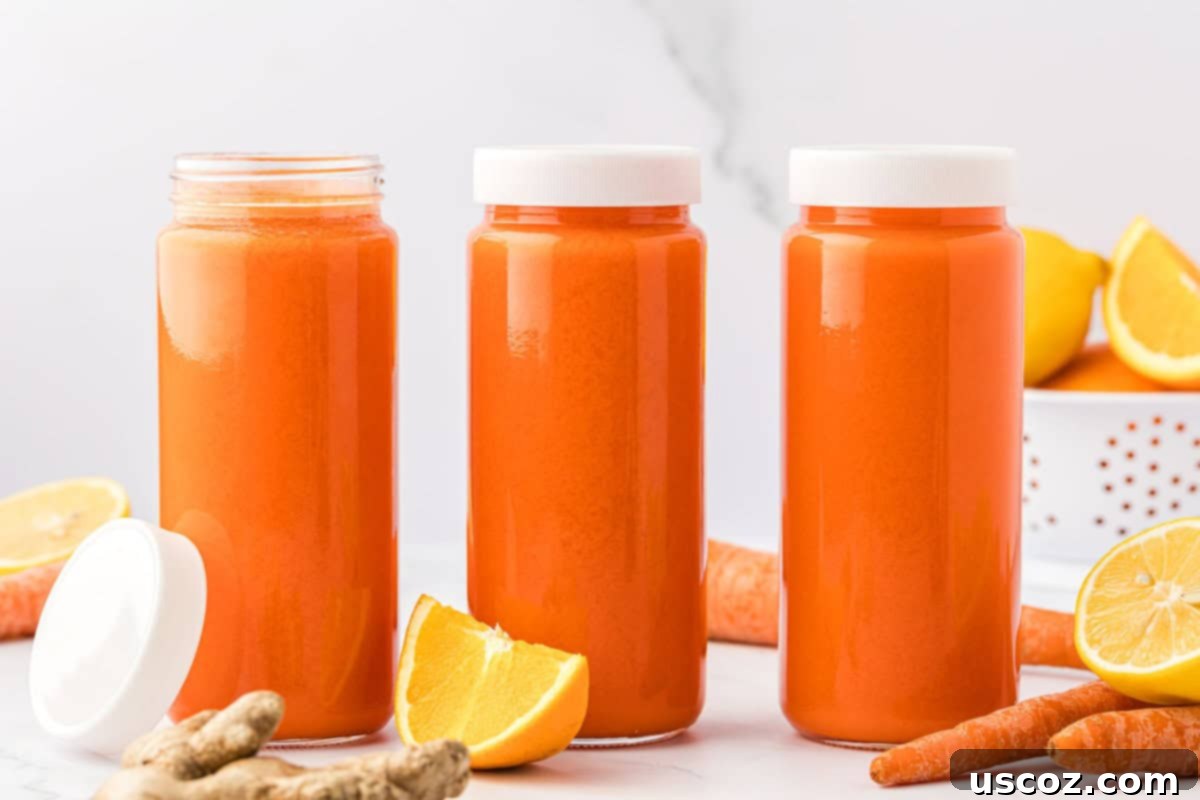 Golden Glow Juice 8 carrot orange juice in 16 oz storage glasses with lids
