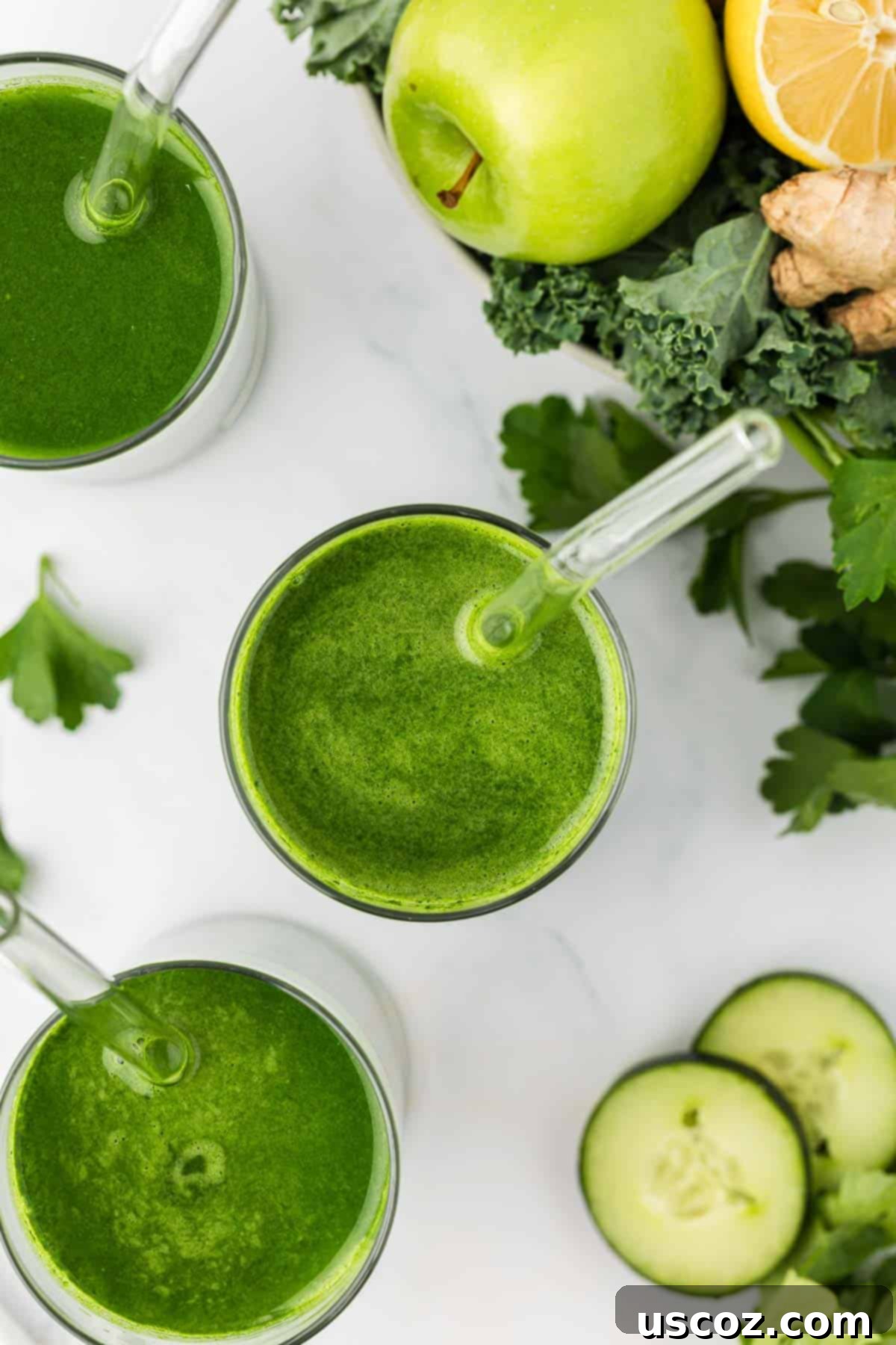 Vital Veggie Boost 7 A glass of green vegetable juice with a straw, placed on a wooden surface.
