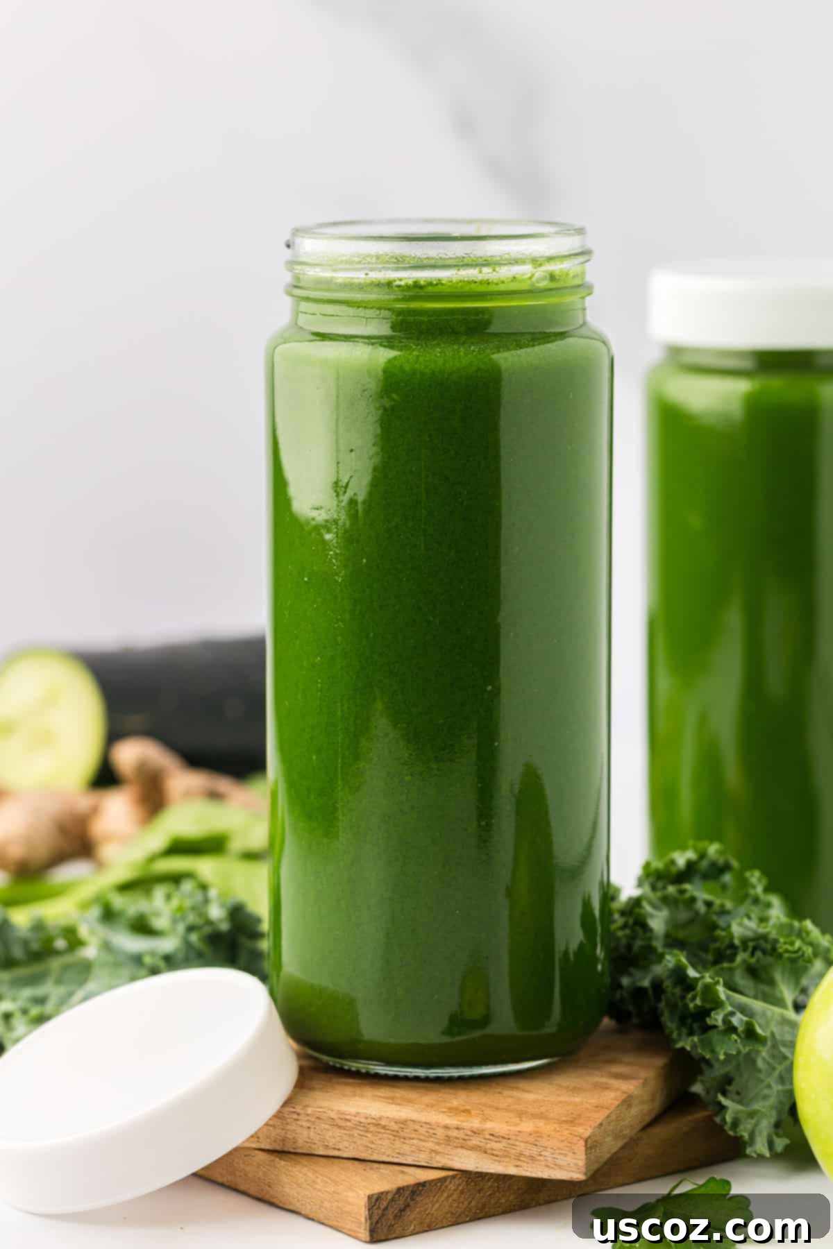 Vital Veggie Boost 9 A glass jar filled with green vegetable juice, sealed with an airtight lid for storage.