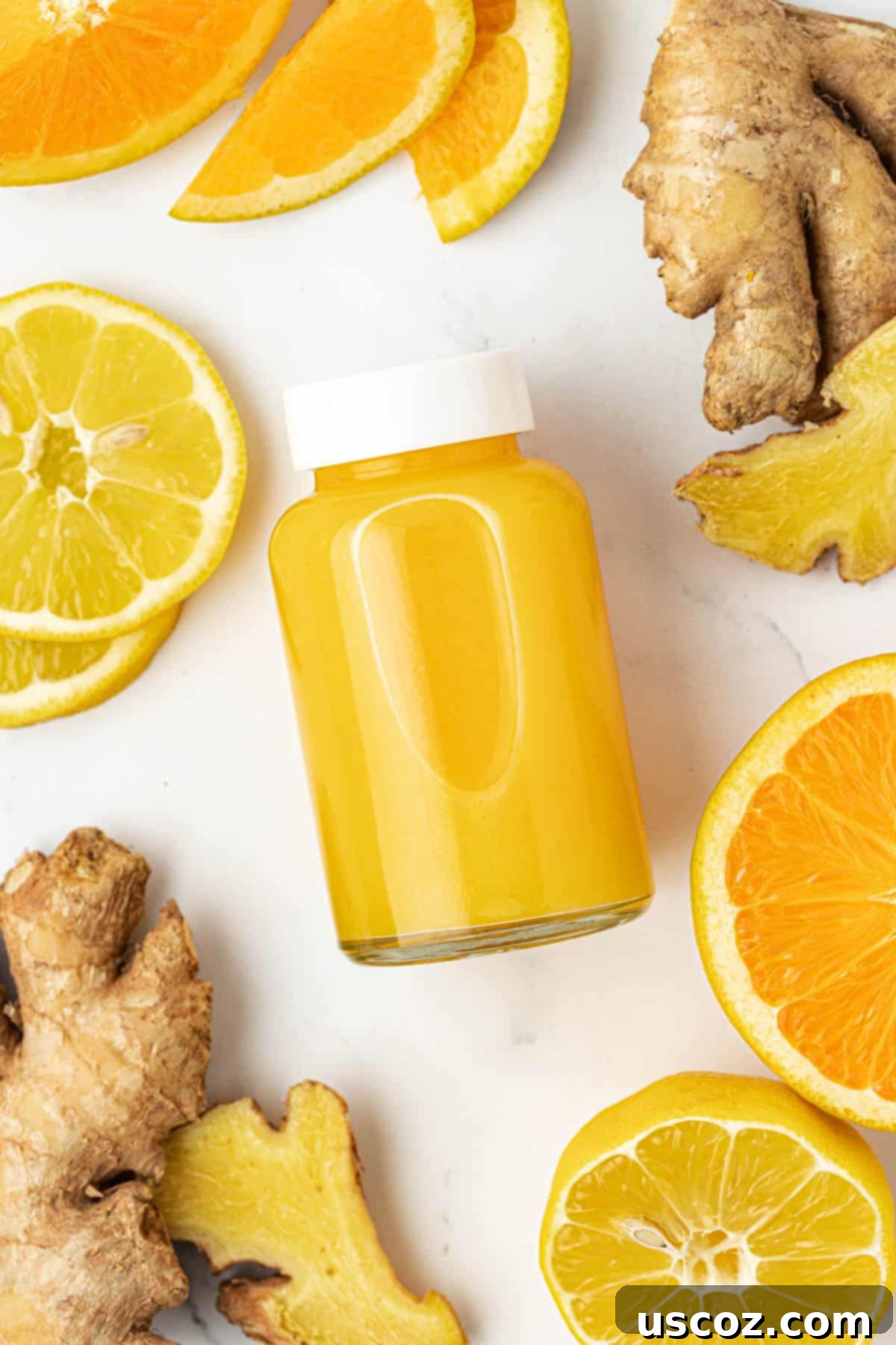 Immune Boost Shots 3 Close-up of fresh oranges, lemon, and ginger, the three core ingredients for immunity shots.